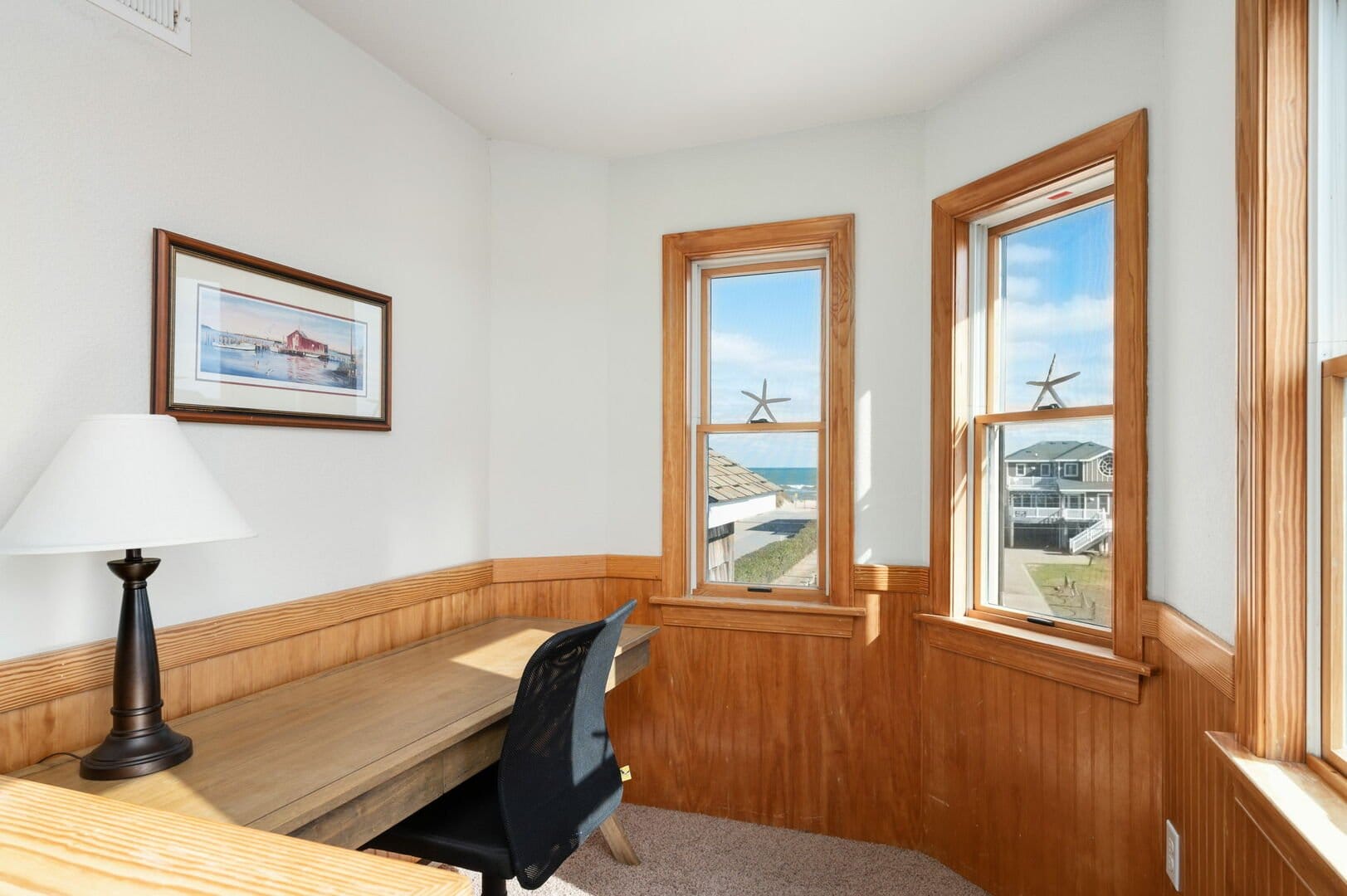 Cozy workspace with ocean view.