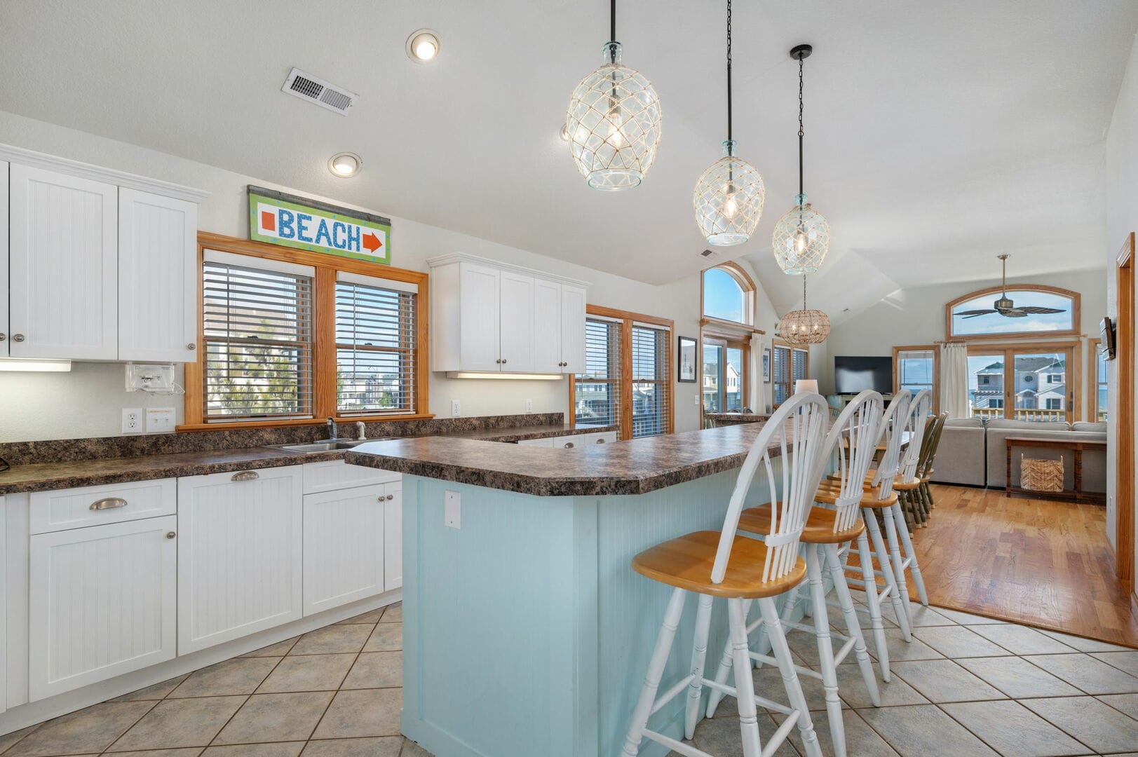 Bright kitchen and living area, decorated.