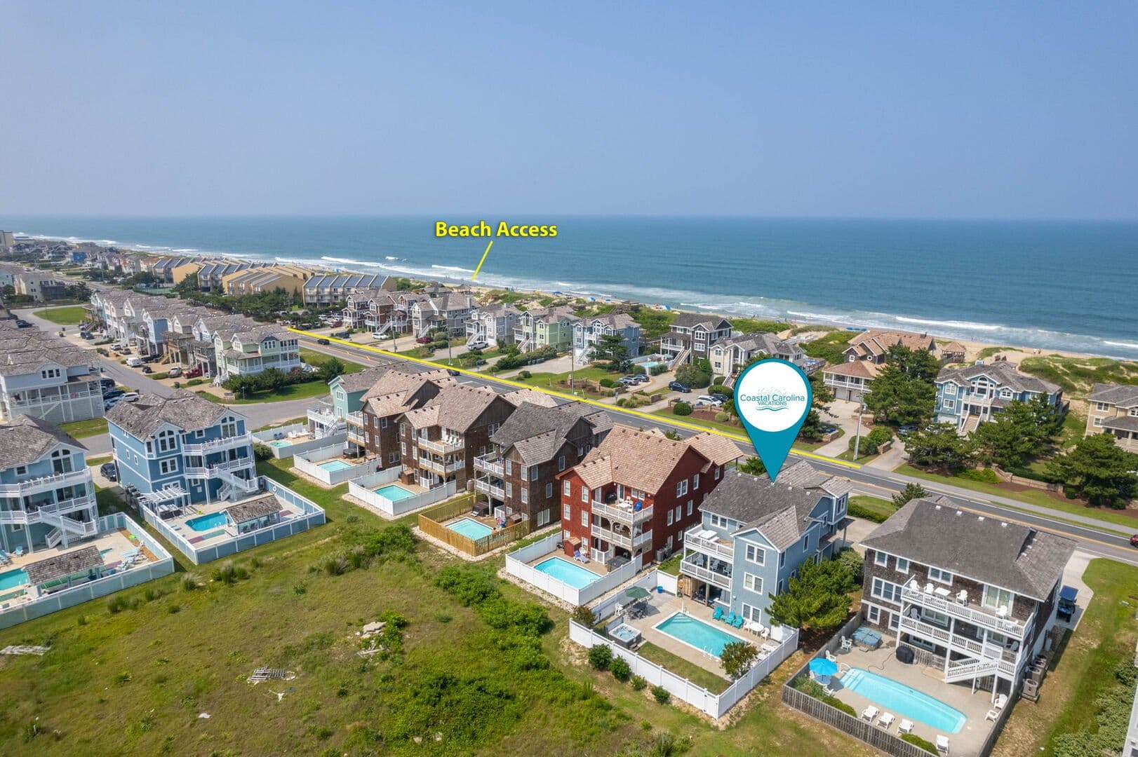 Aerial view of beachfront houses.