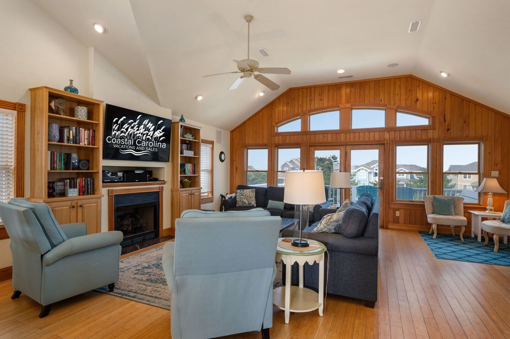 Spacious living room with large windows.