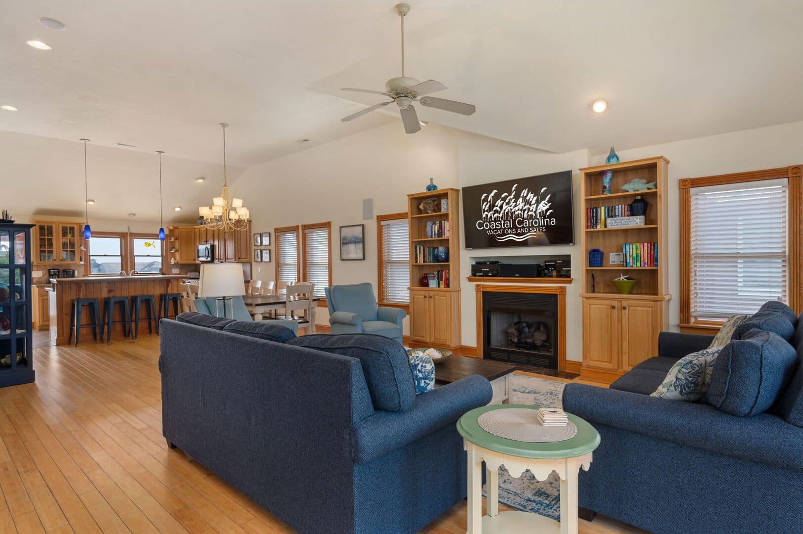 Spacious open-concept living room, kitchen.