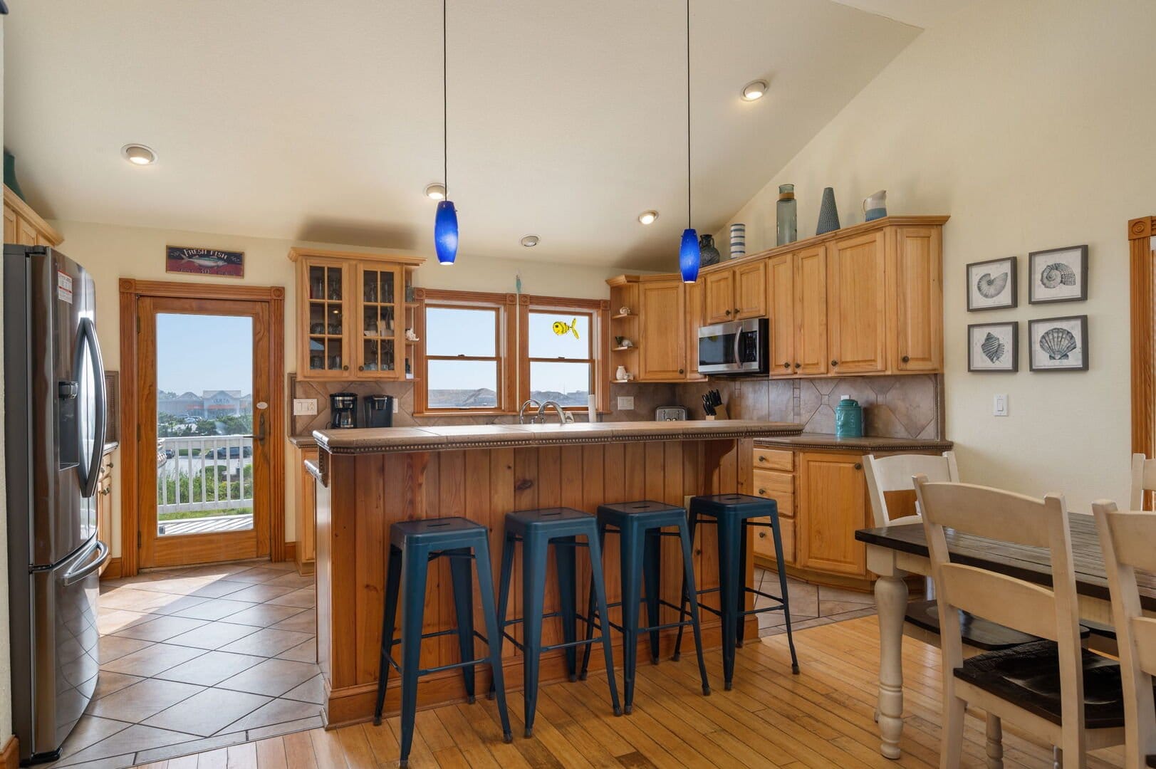 Cozy kitchen with wooden cabinets.