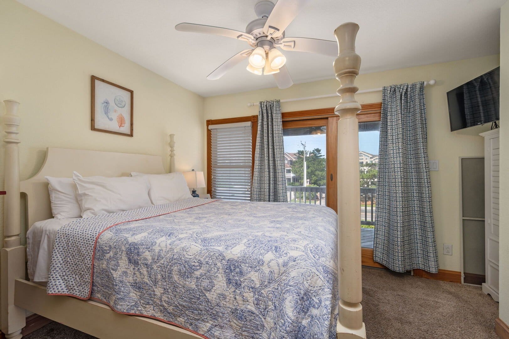 Cozy bedroom with large bed.