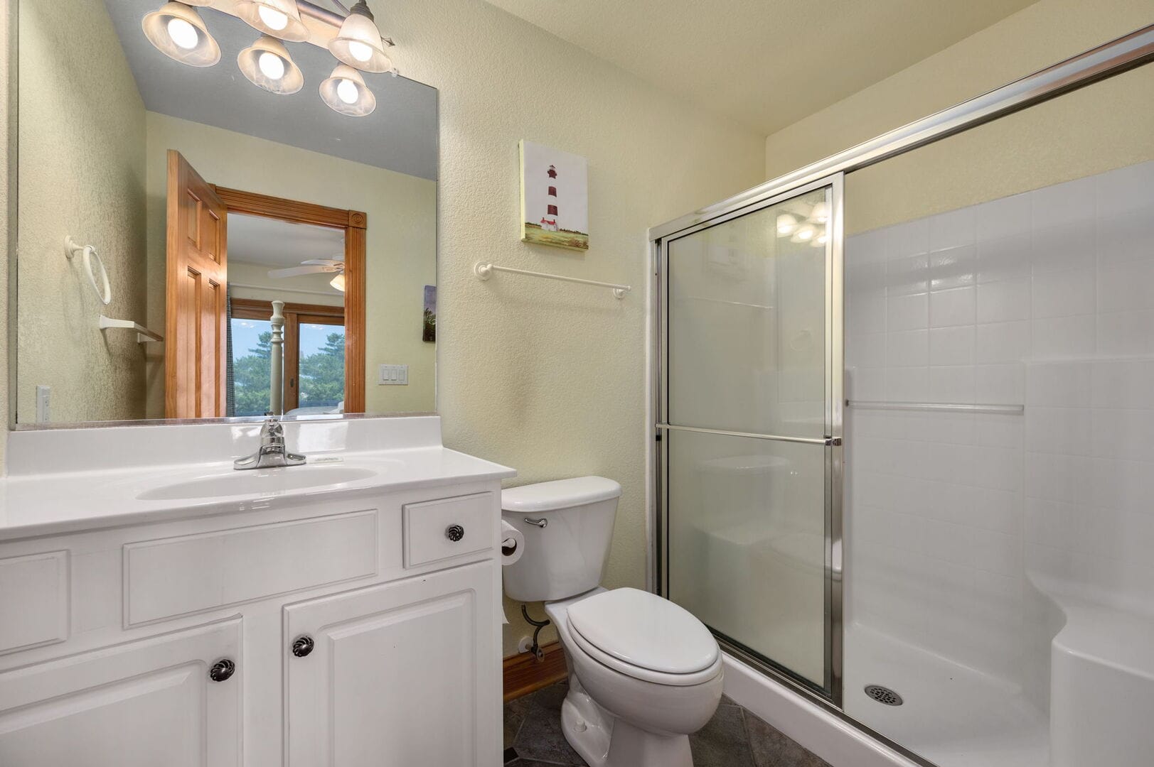 Bathroom with shower and vanity.