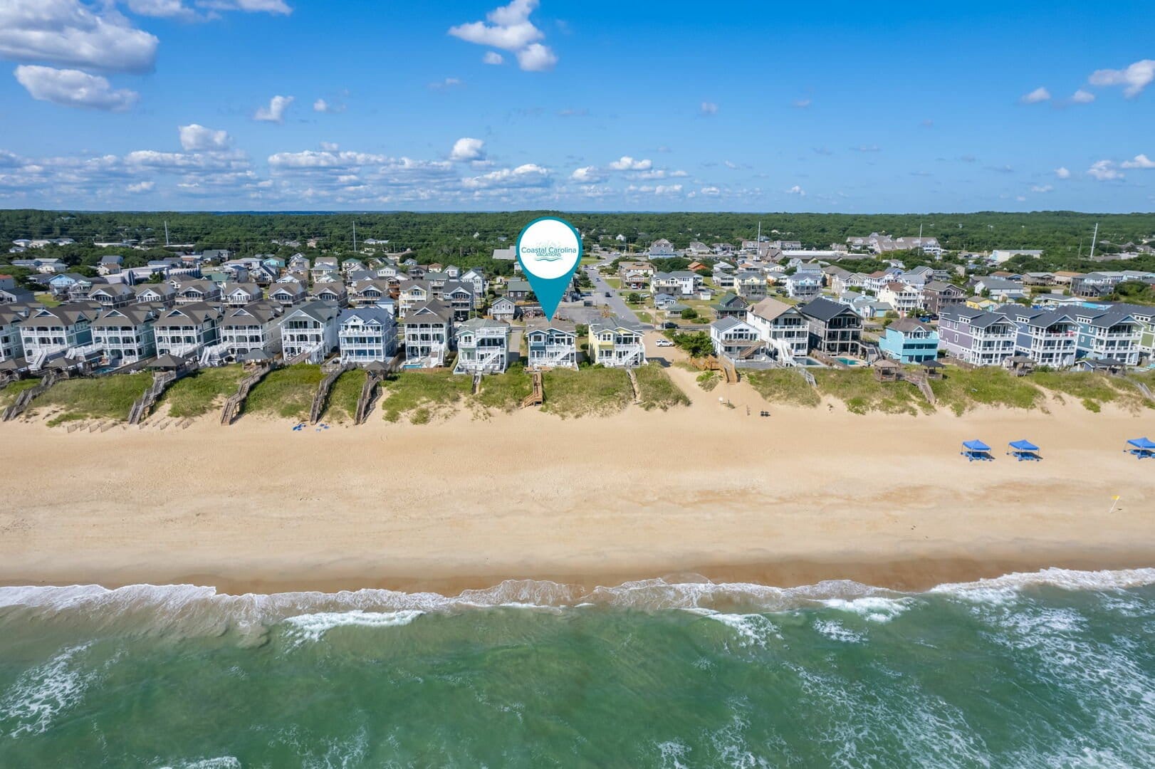 Beachfront houses with ocean view.