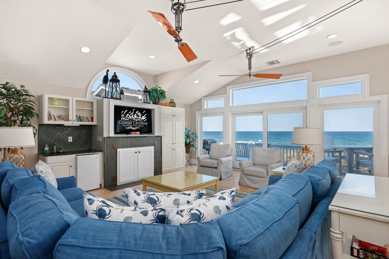 Coastal living room with ocean view.