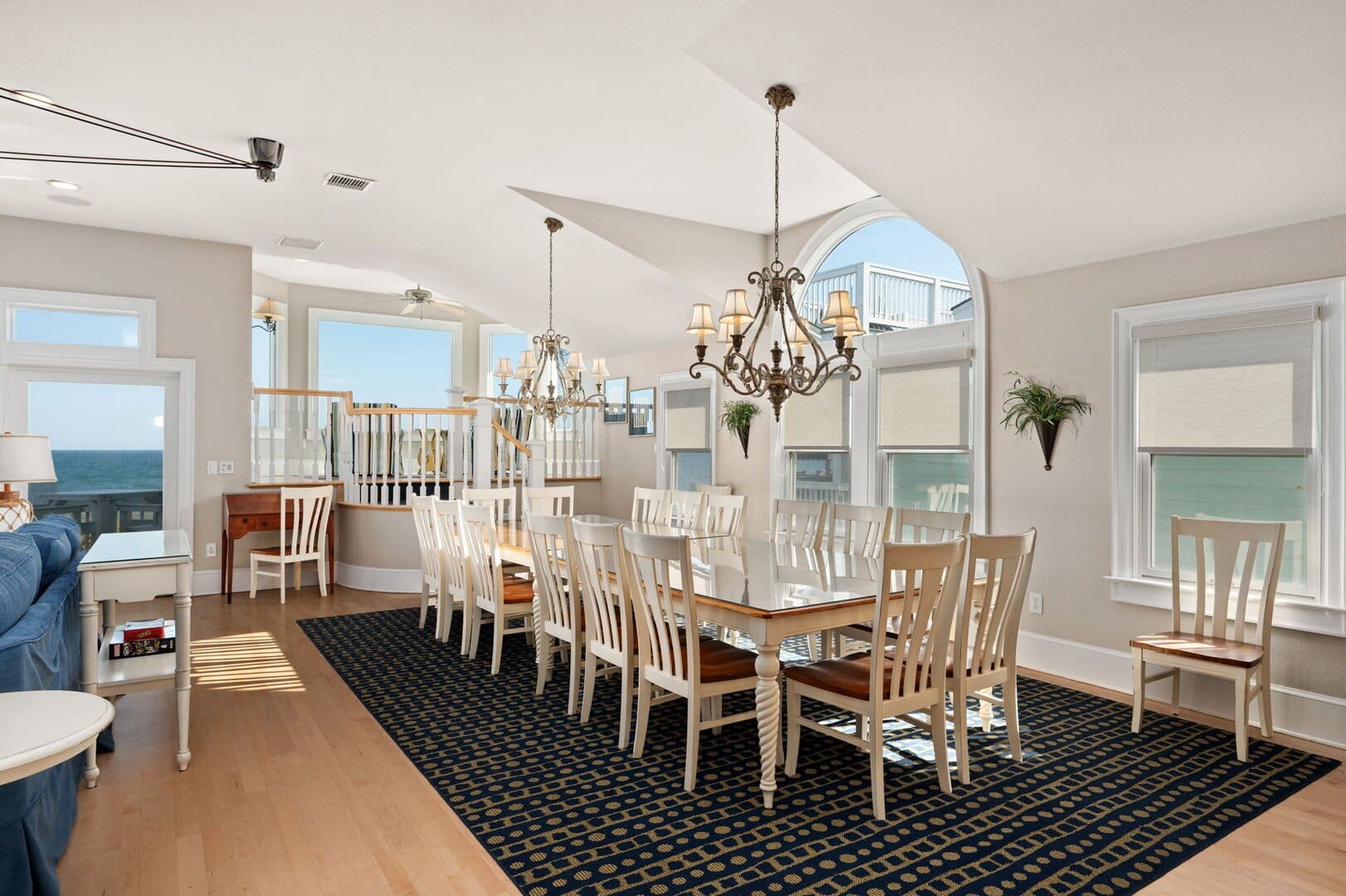 Elegant dining room with chandeliers.