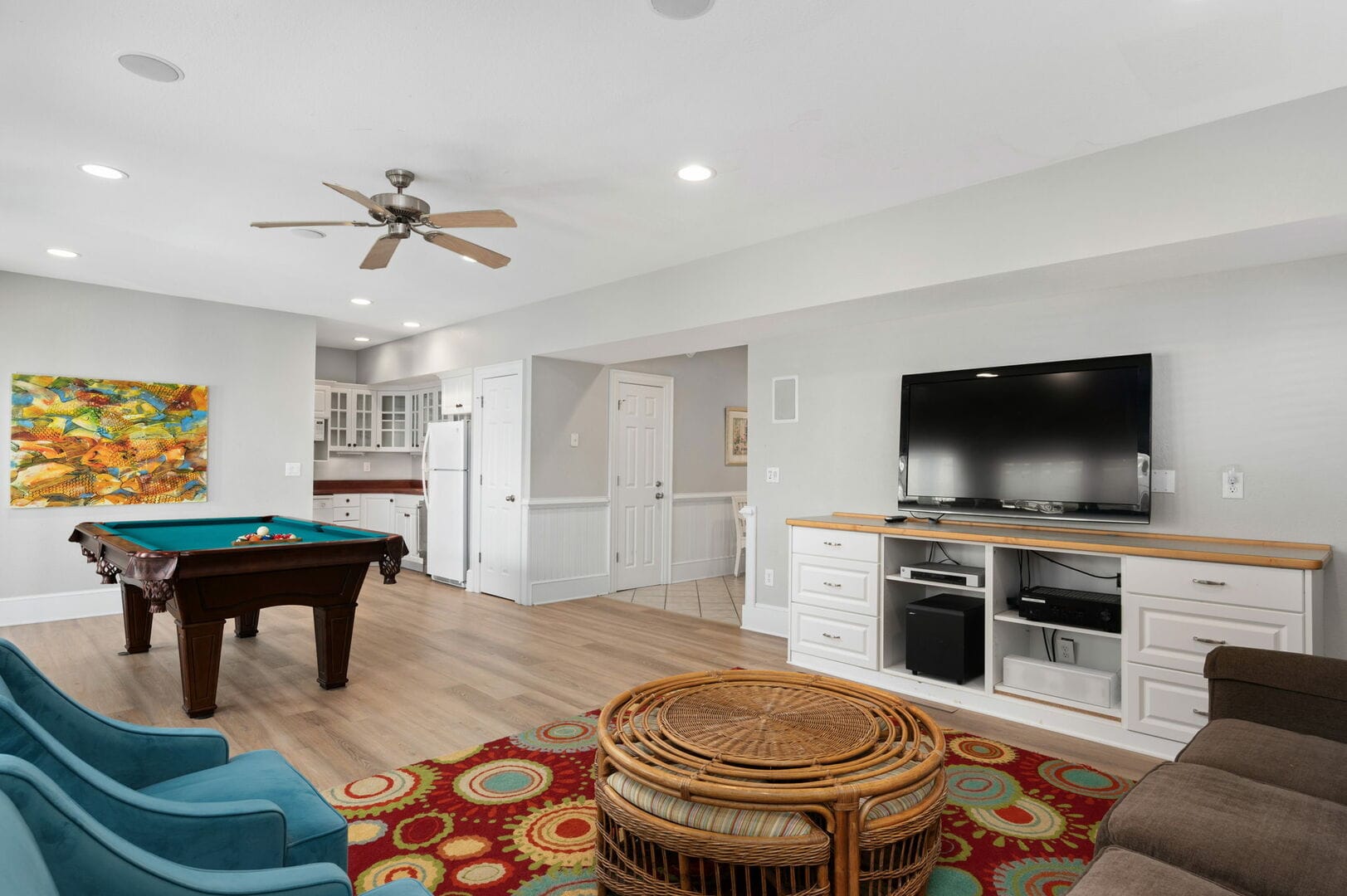 Game room with pool table, TV.