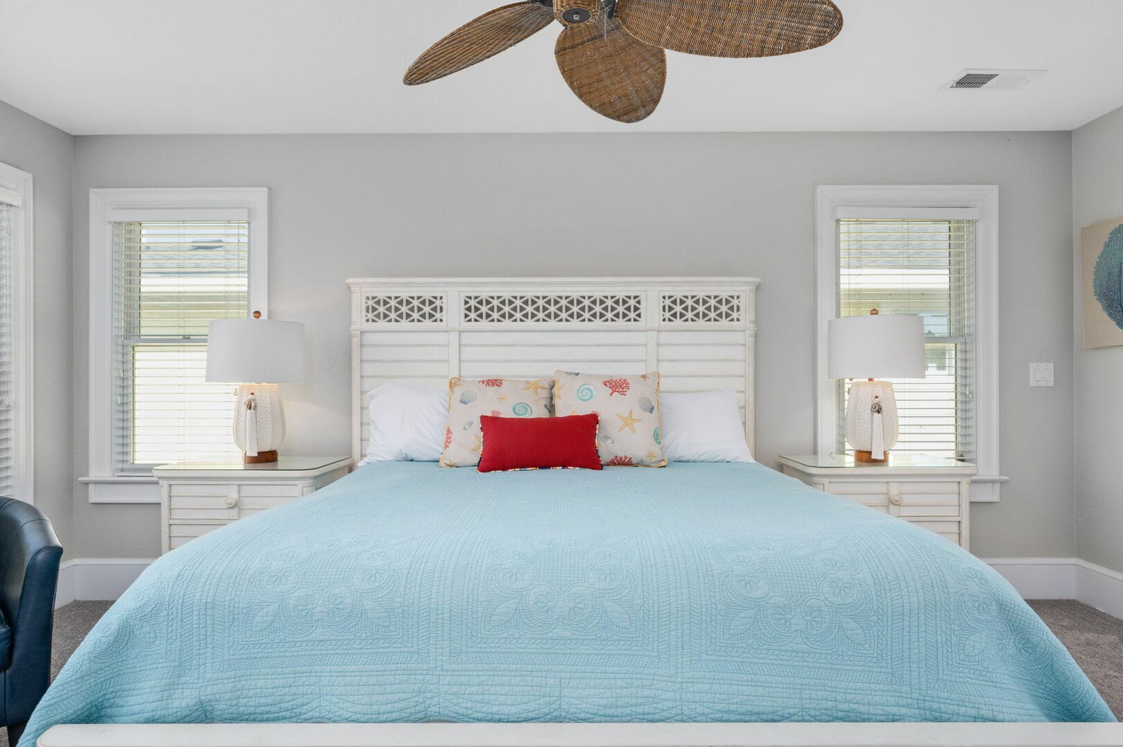 Bedroom with blue bedspread.