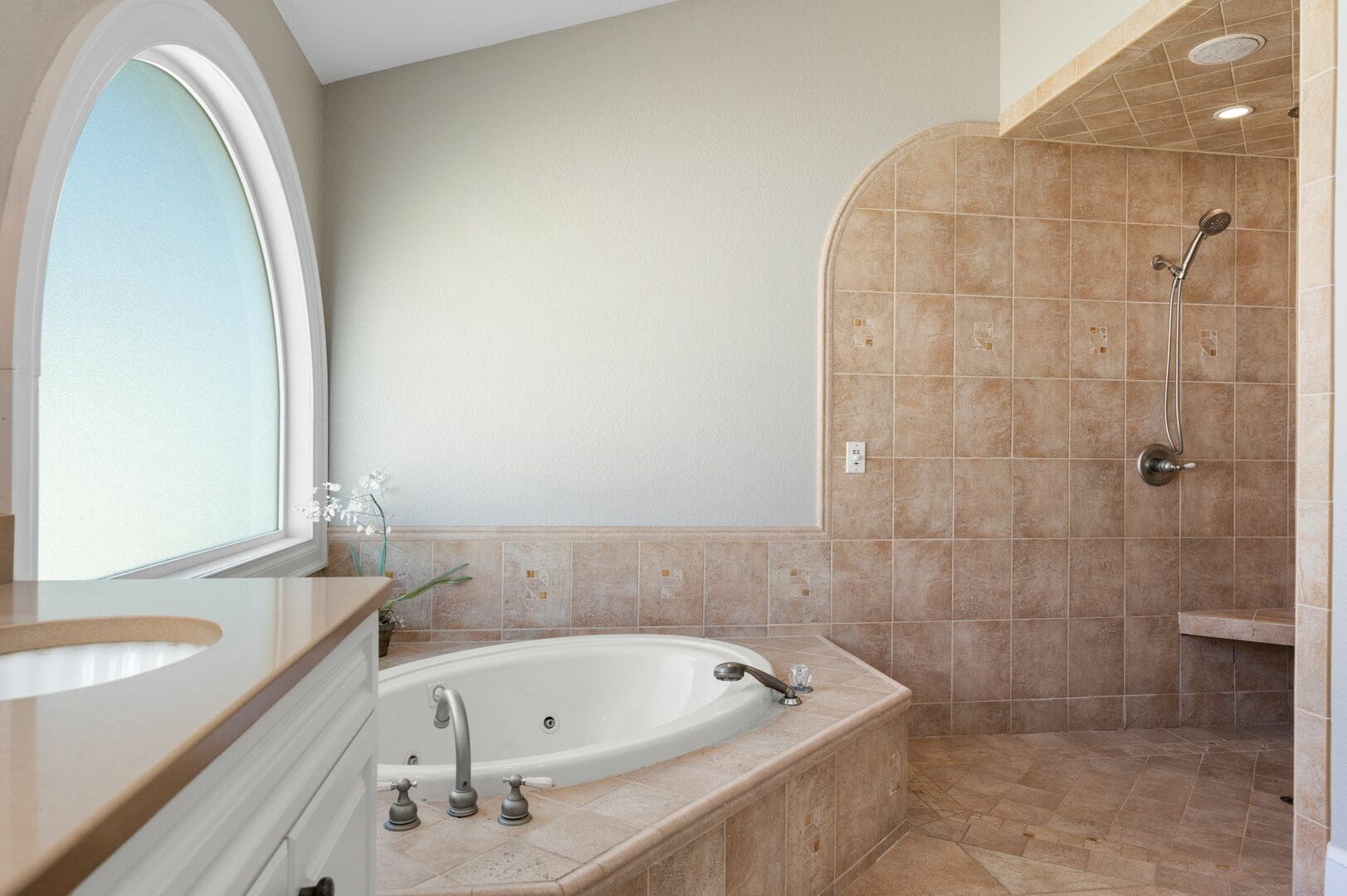 Bathroom with tub and shower.