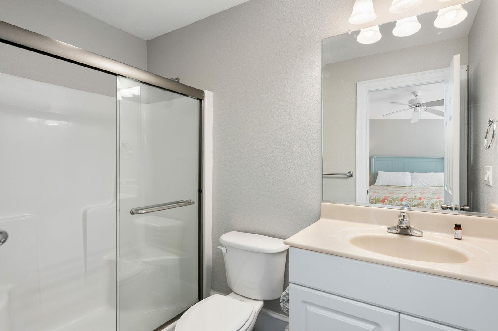 Bathroom with sink and shower.