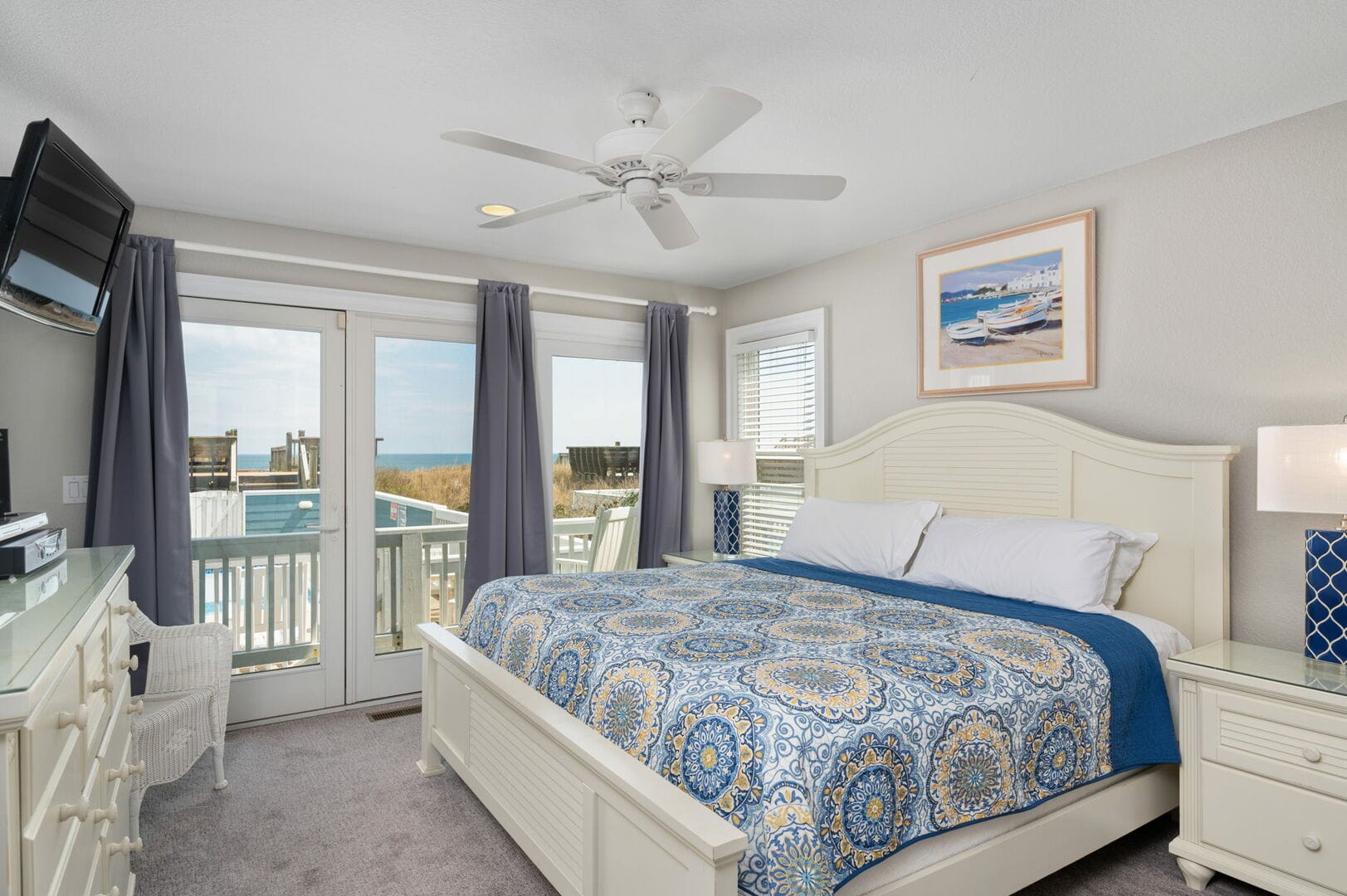 Cozy bedroom with ocean view.