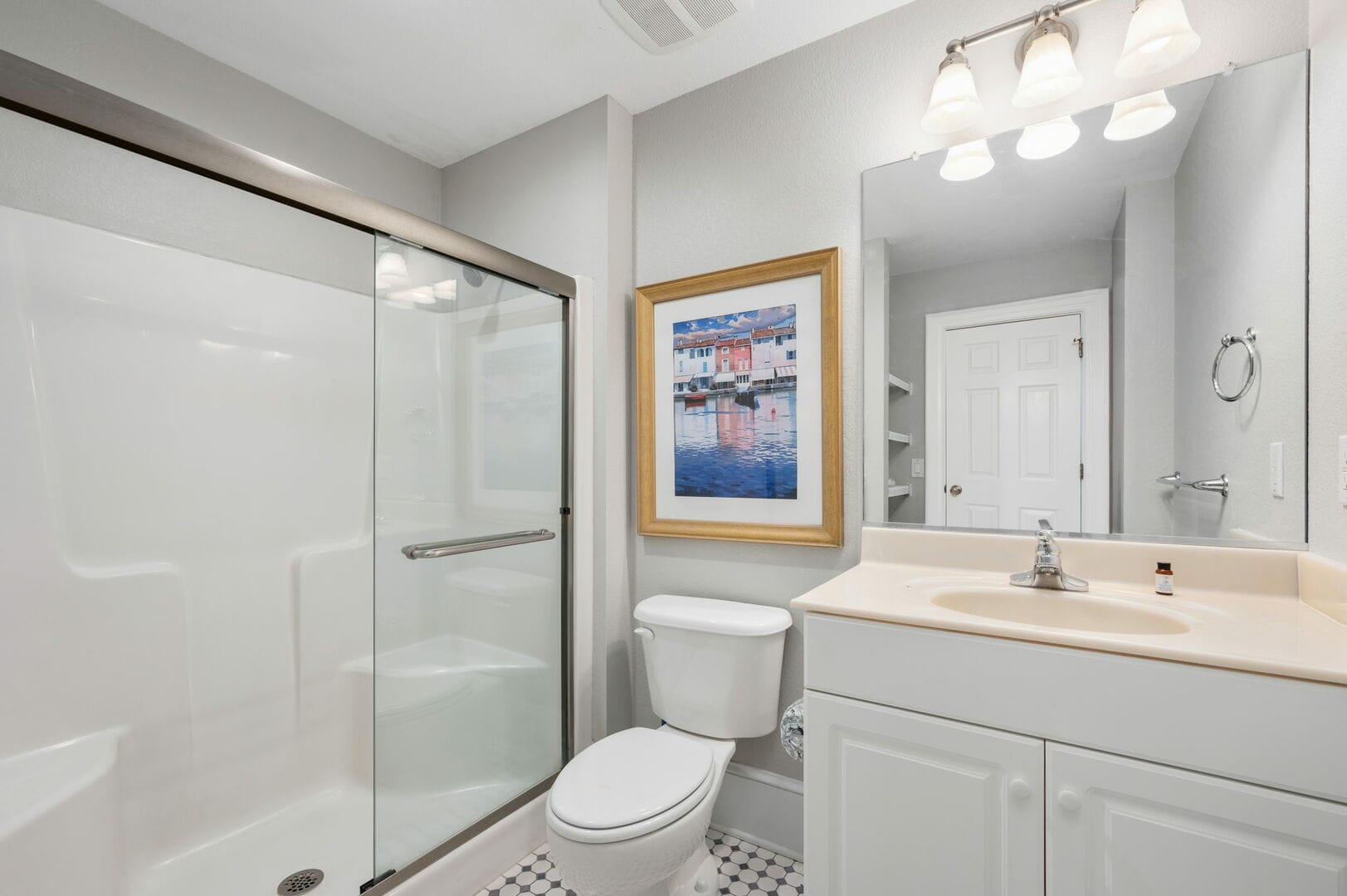 Modern white bathroom with shower.