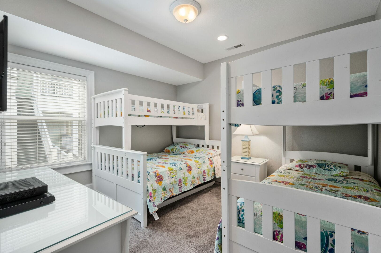 Room with two bunk beds.