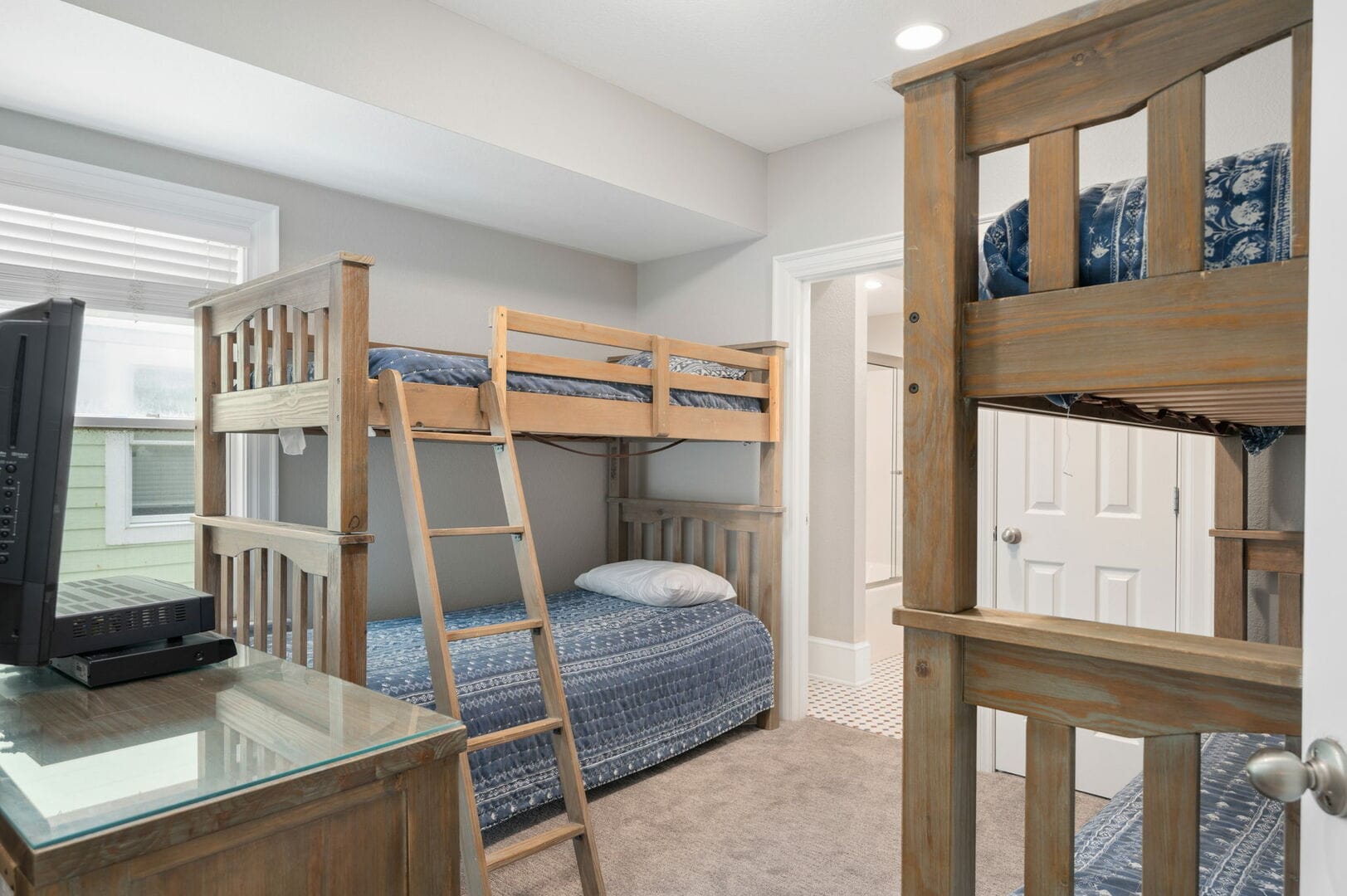 Bedroom with wooden bunk beds.