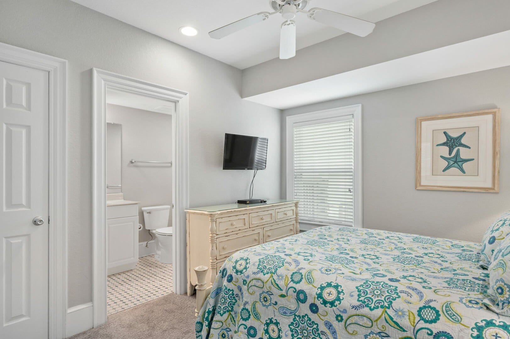 Bright bedroom with bathroom, decor.