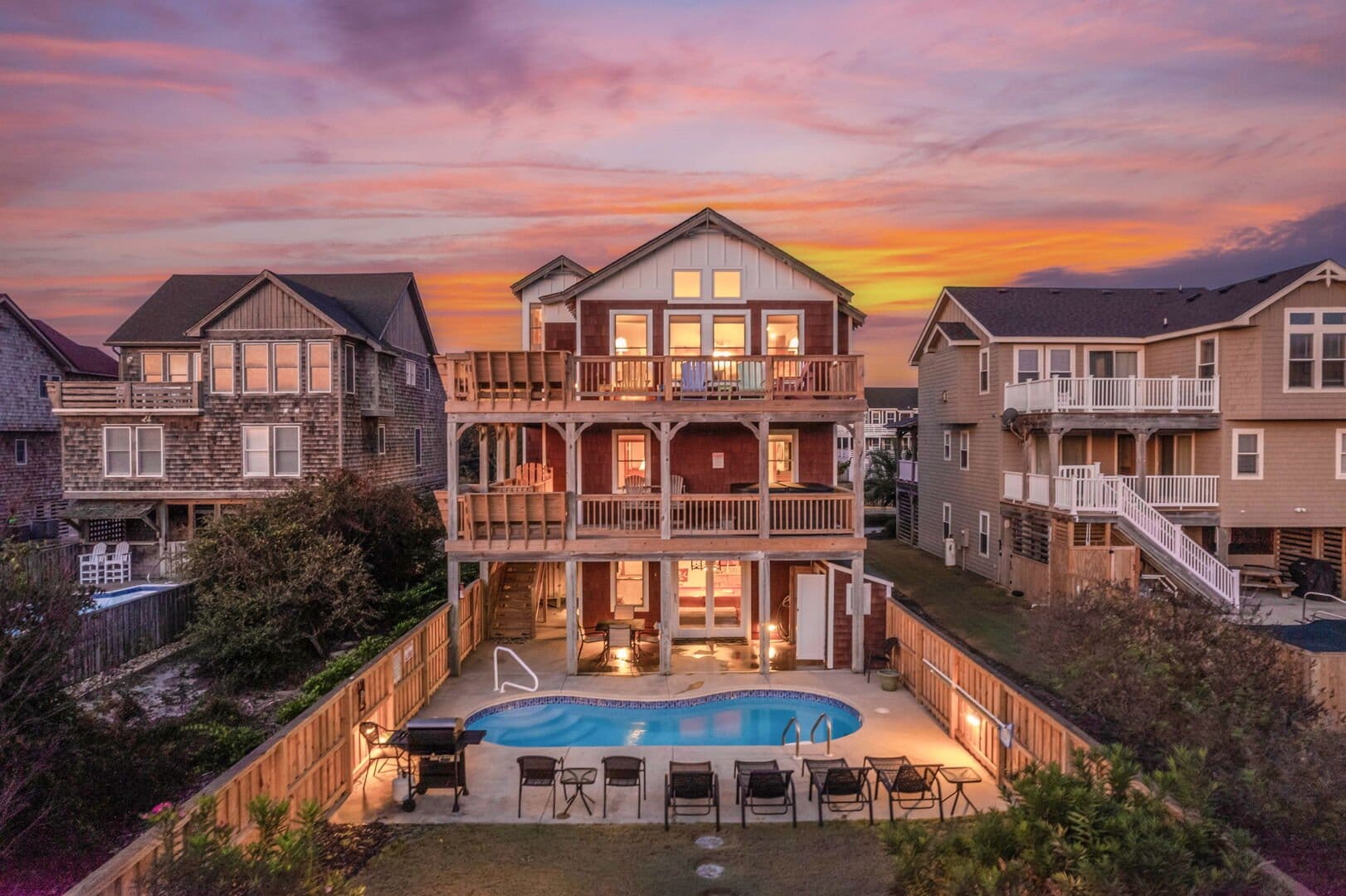 House with pool at sunset.