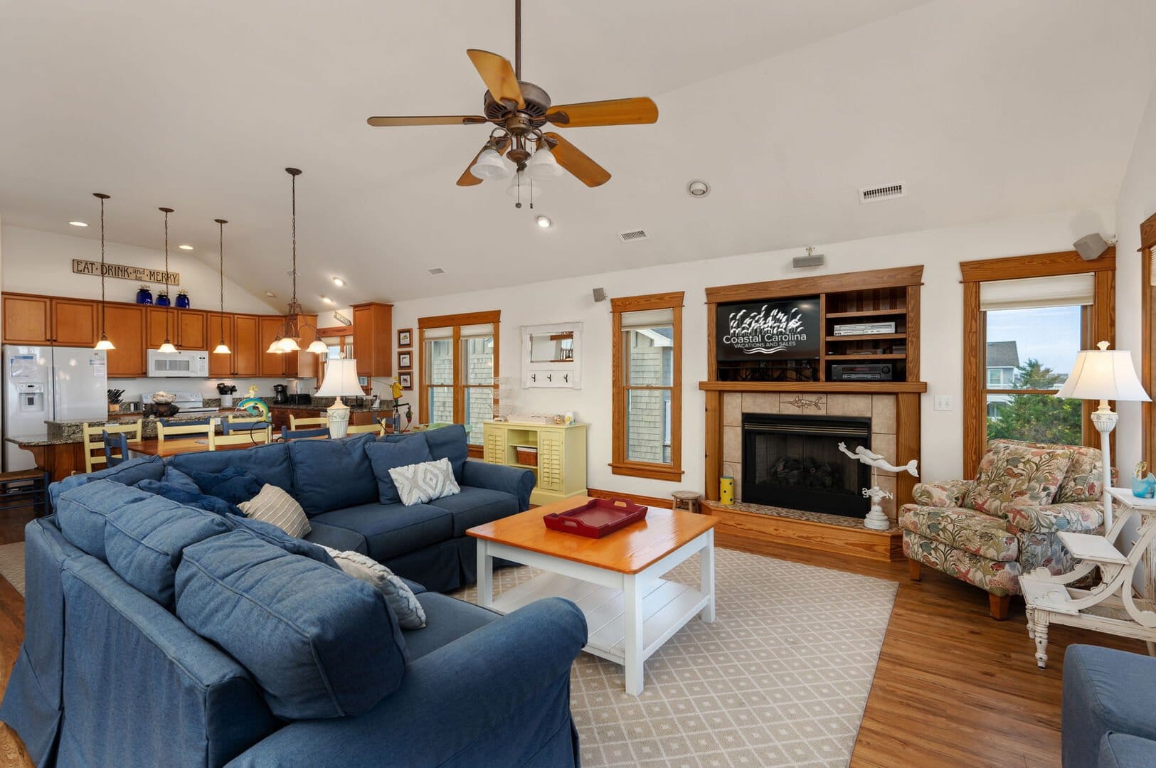 Living room with blue sofa.