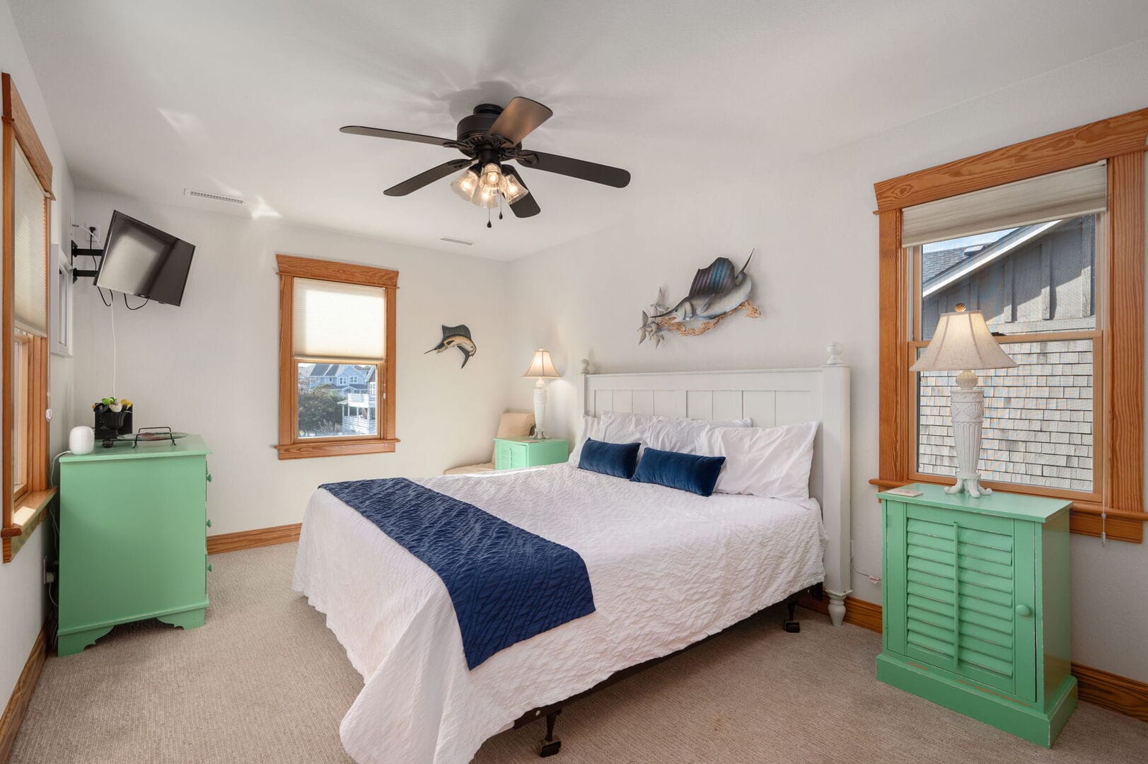 Bedroom with bed and nightstands.