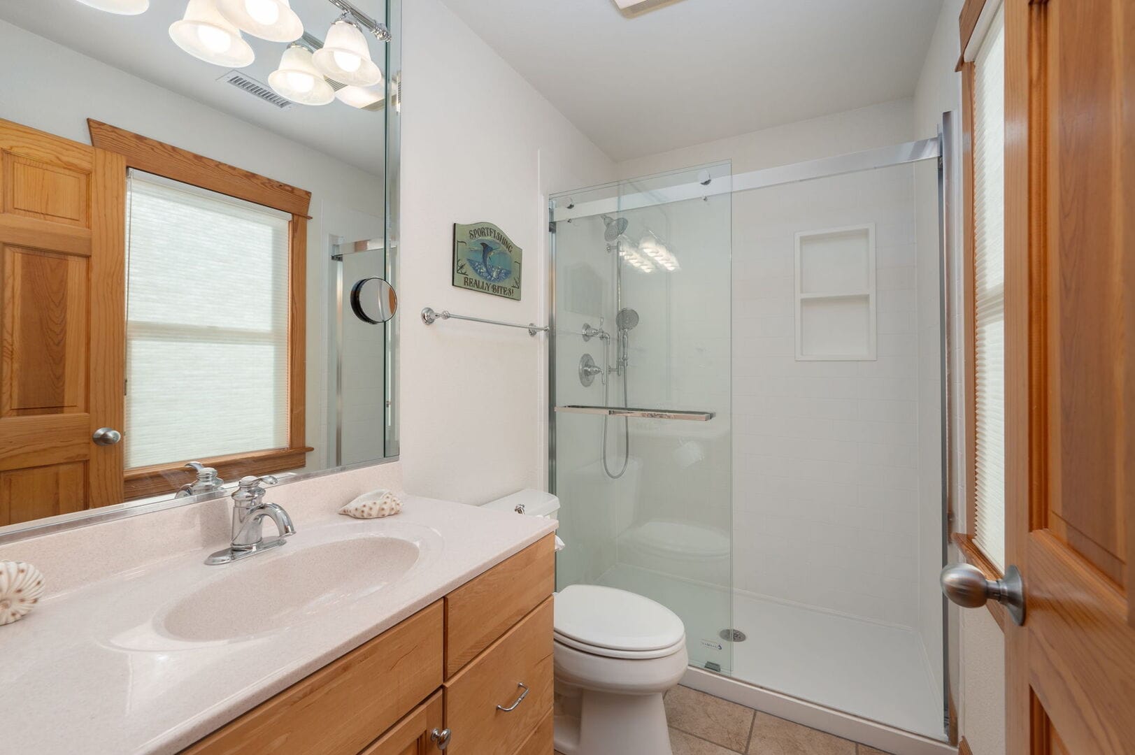 Bathroom with shower and sink.