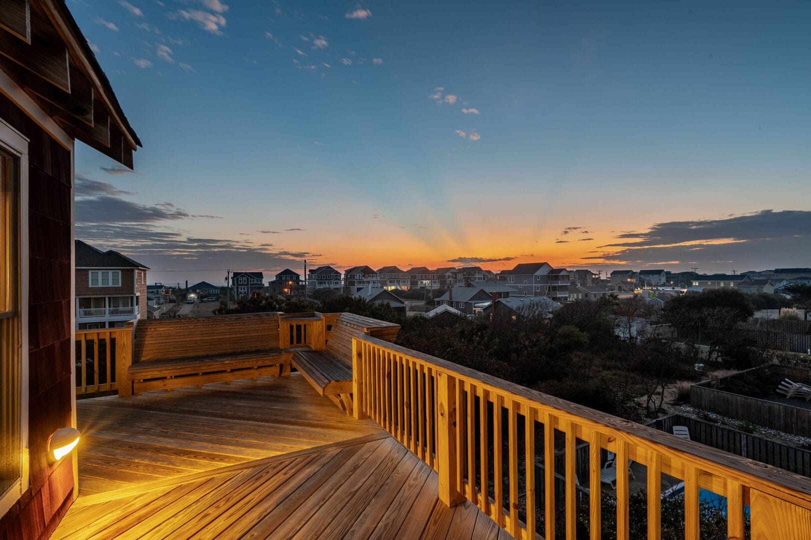Sunset view from wooden deck.