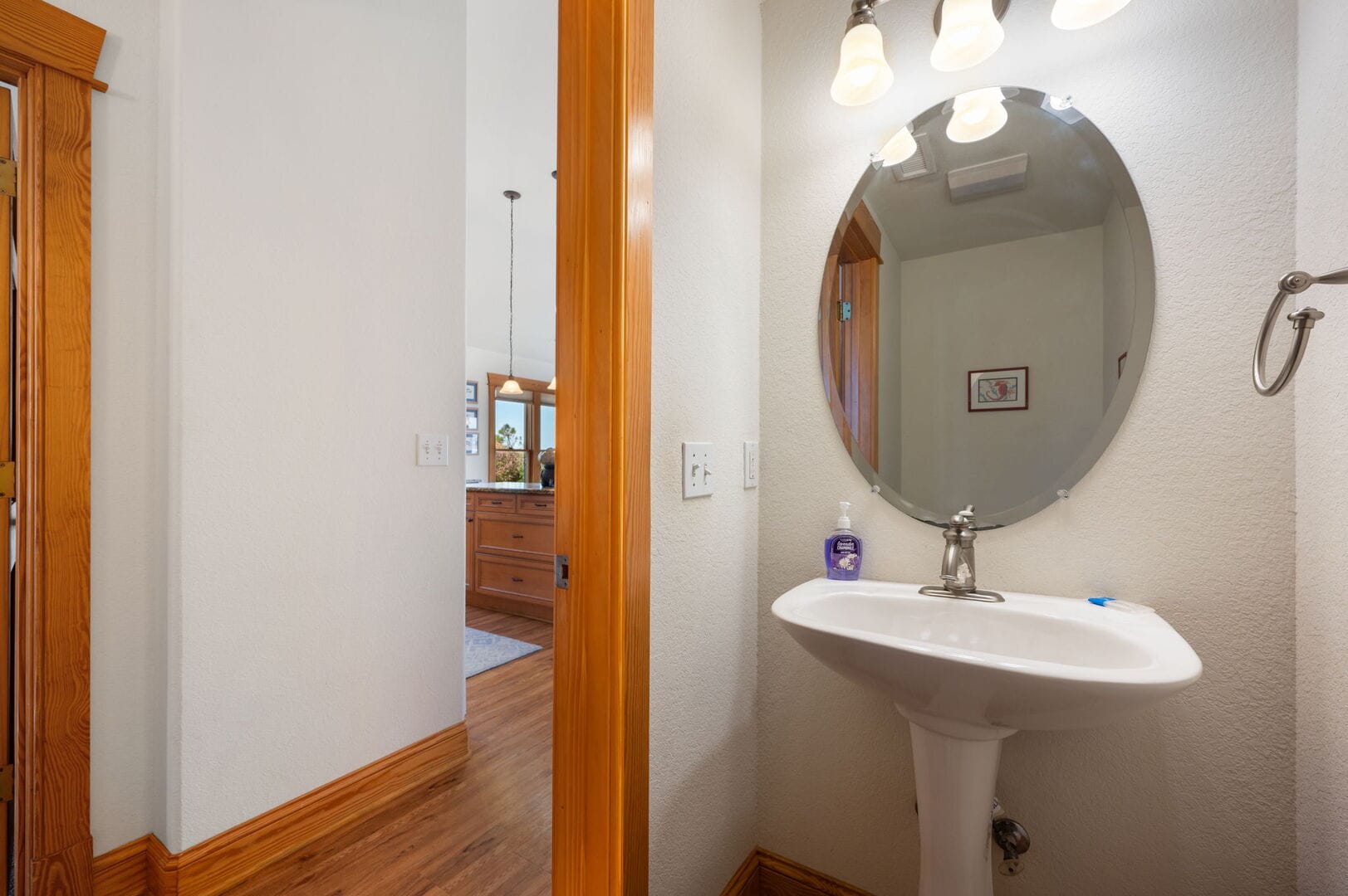 Bathroom with mirror and sink.