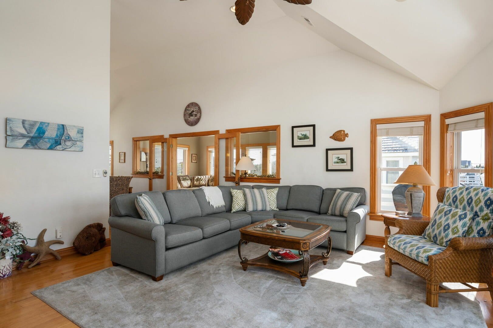 Cozy living room with gray sofa.