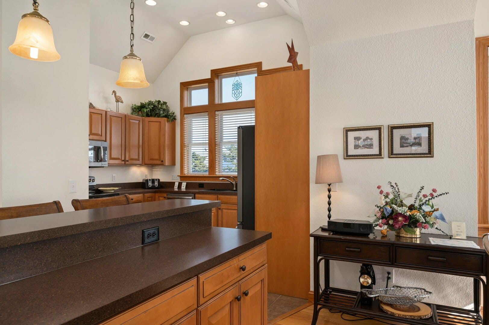 Modern kitchen with warm lighting.