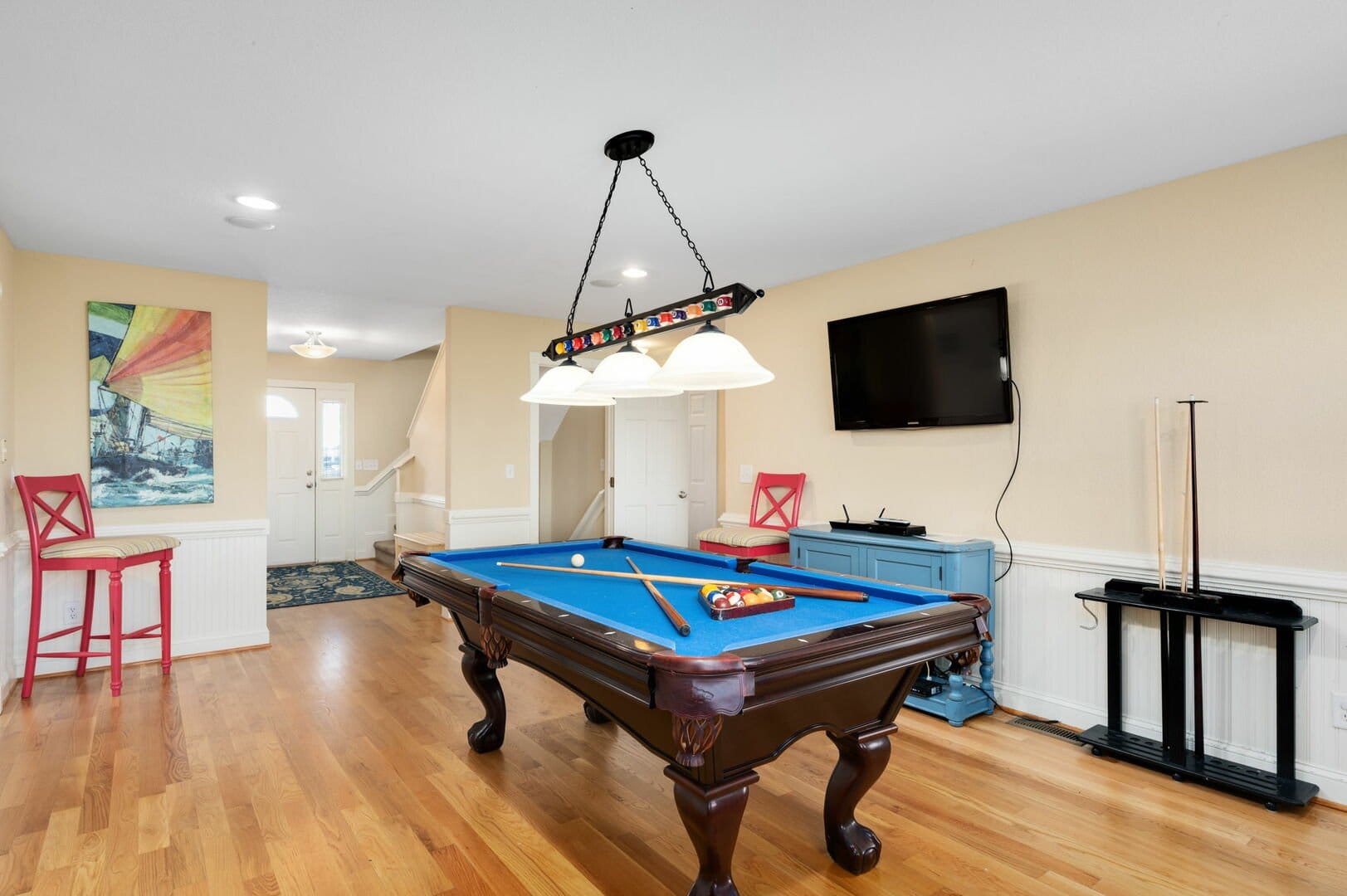 Room with billiards table.
