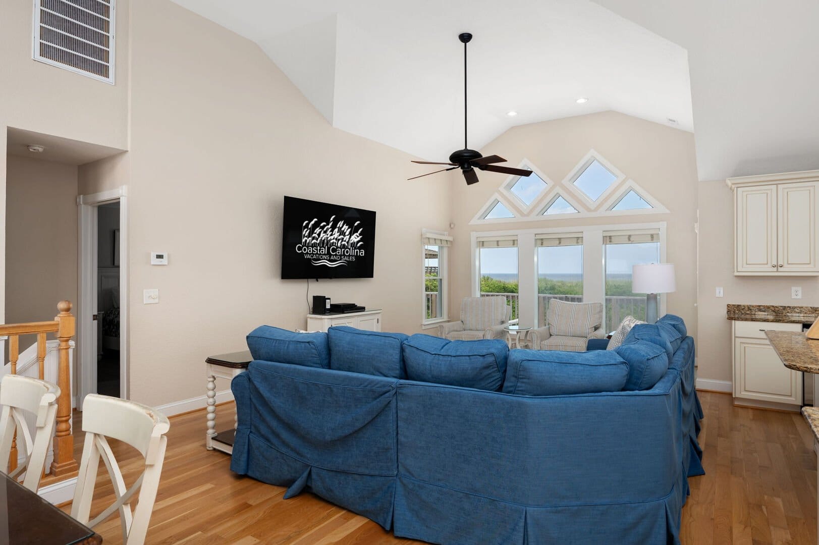 Living room with blue sofa.
