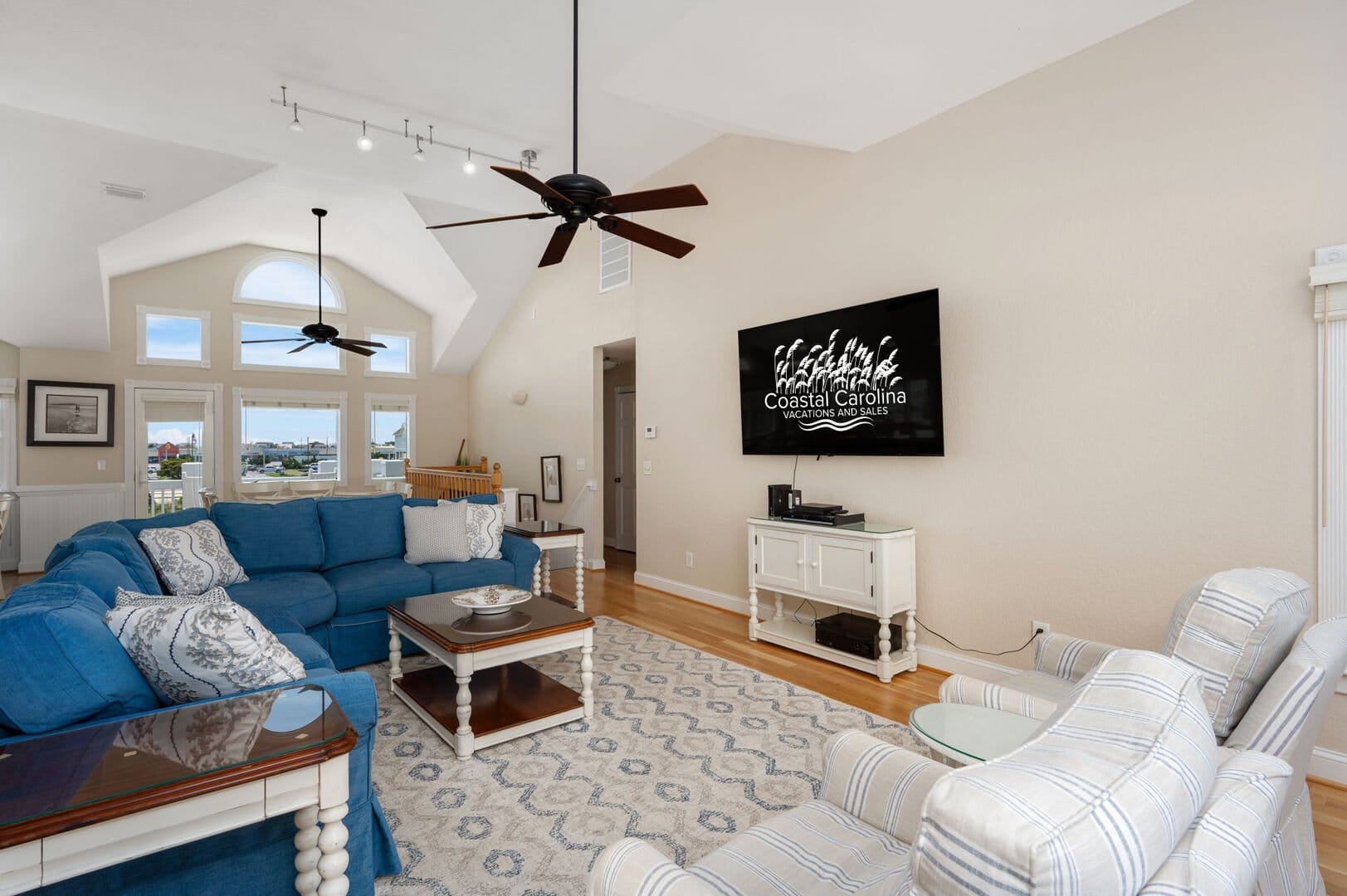 Living room with blue sofa.