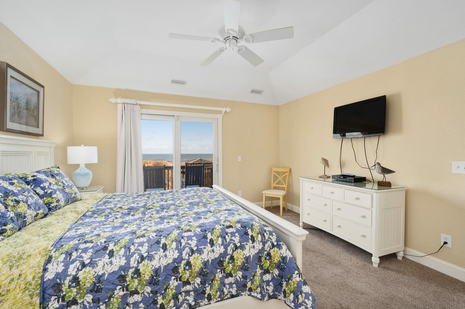 Bedroom with ocean view balcony.