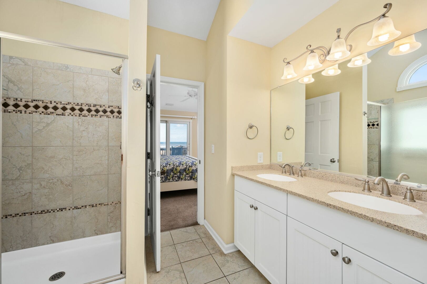 Bathroom with shower and double vanity.
