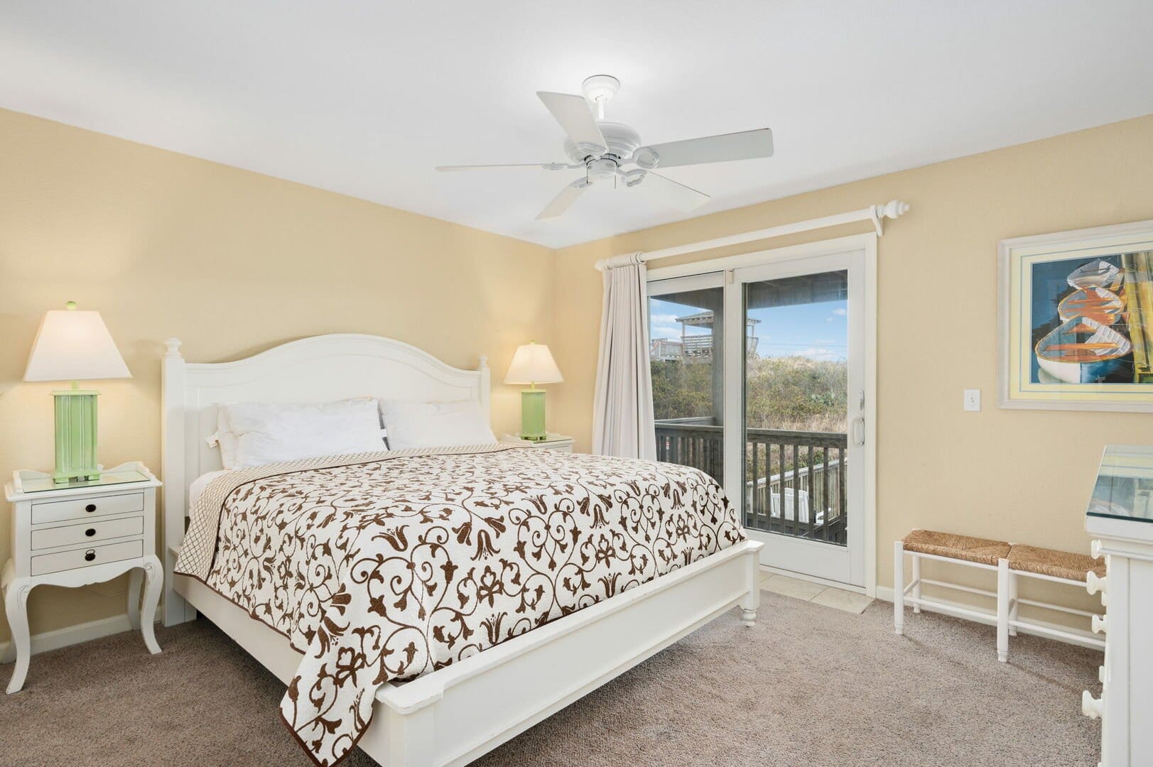 Bedroom with bed and balcony.