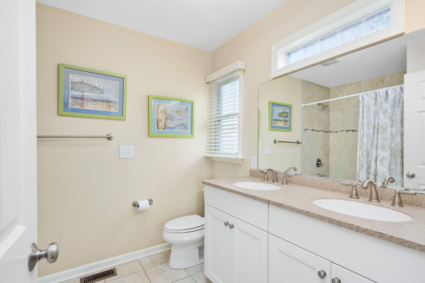 Bathroom with double sinks, decor.