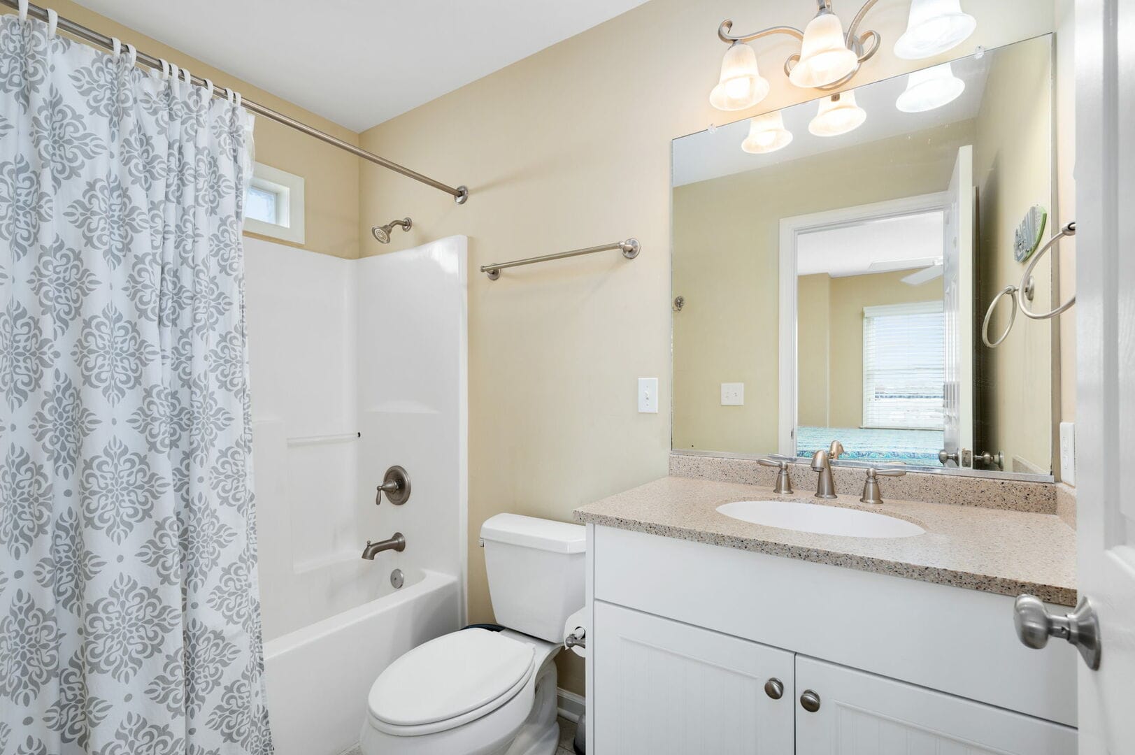 Bathroom with shower and vanity.