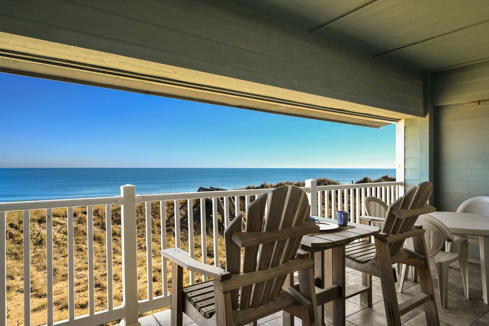 Coastal view from covered balcony.