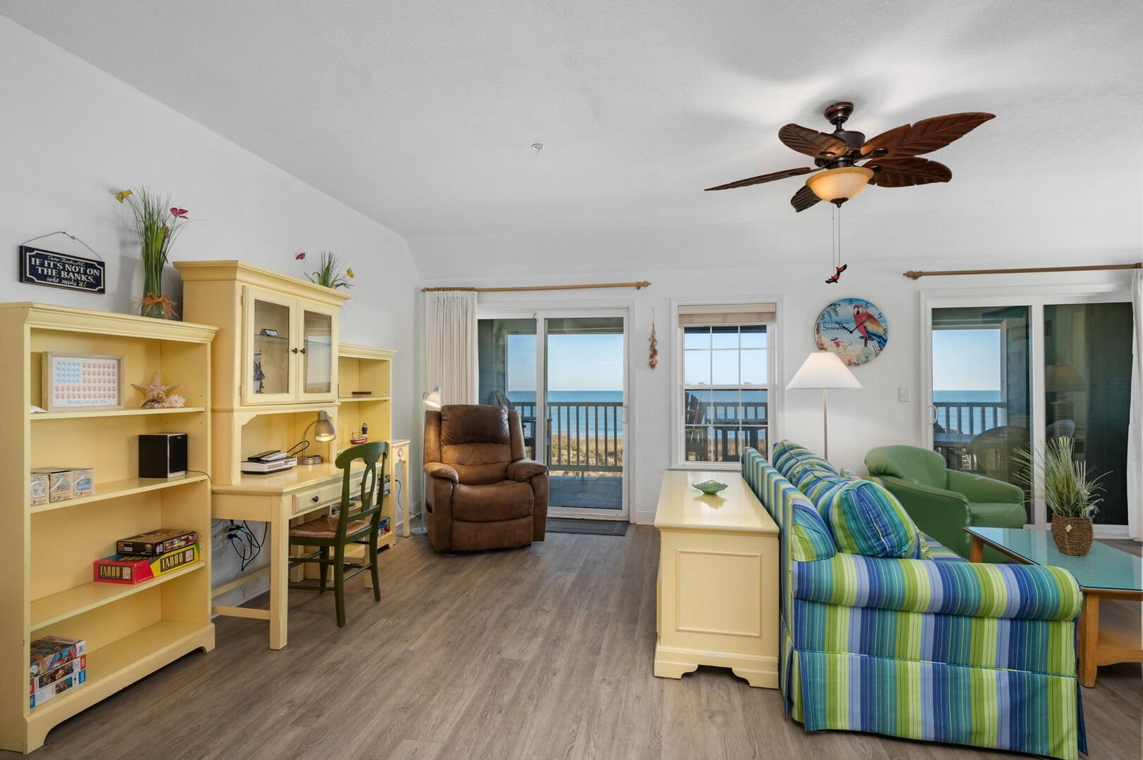 Beach-themed living room, ocean view.