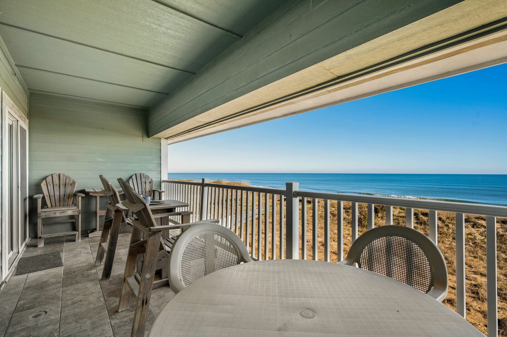 Beachfront balcony with ocean view.