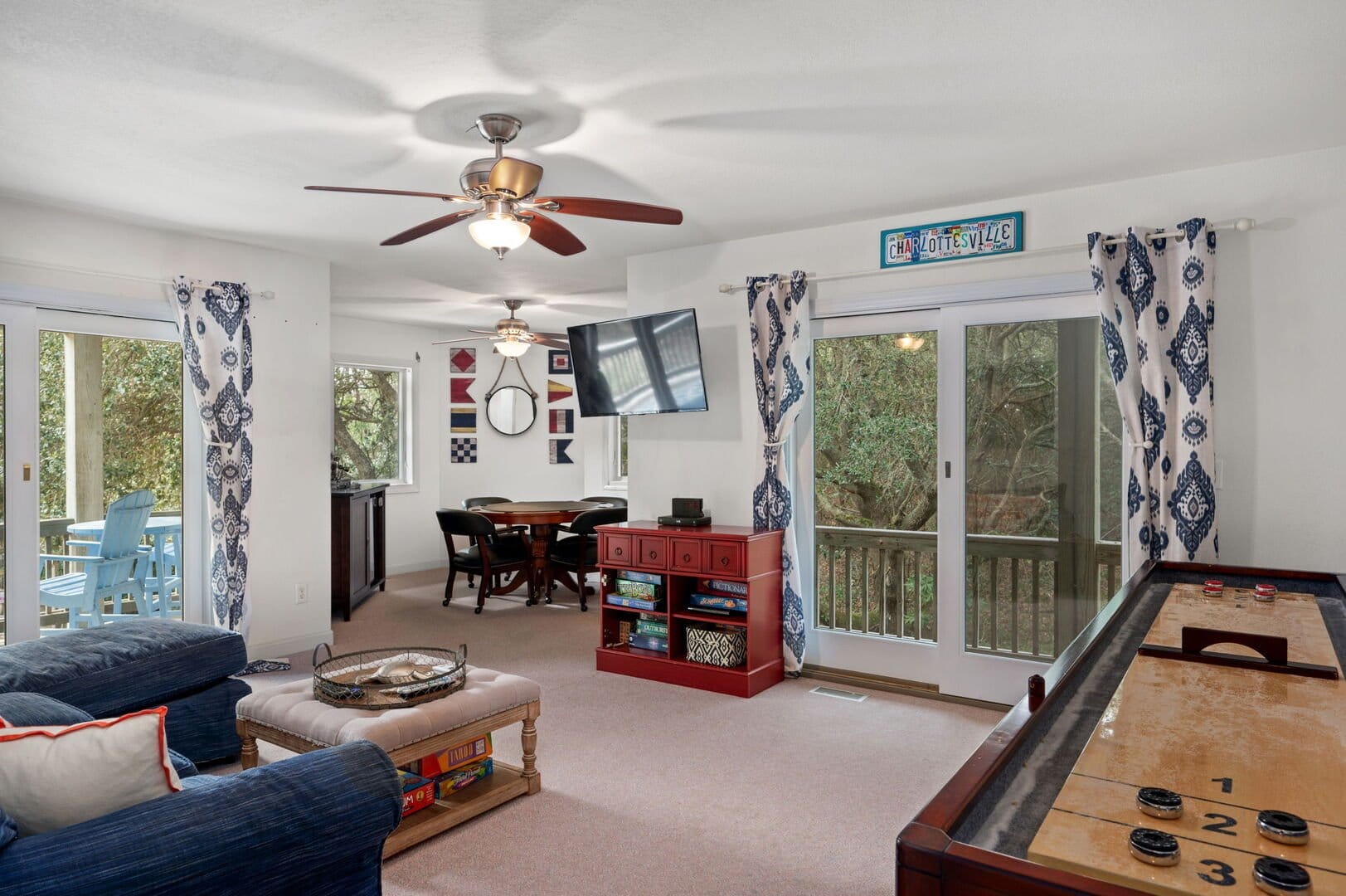 Recreation room with shuffleboard table.