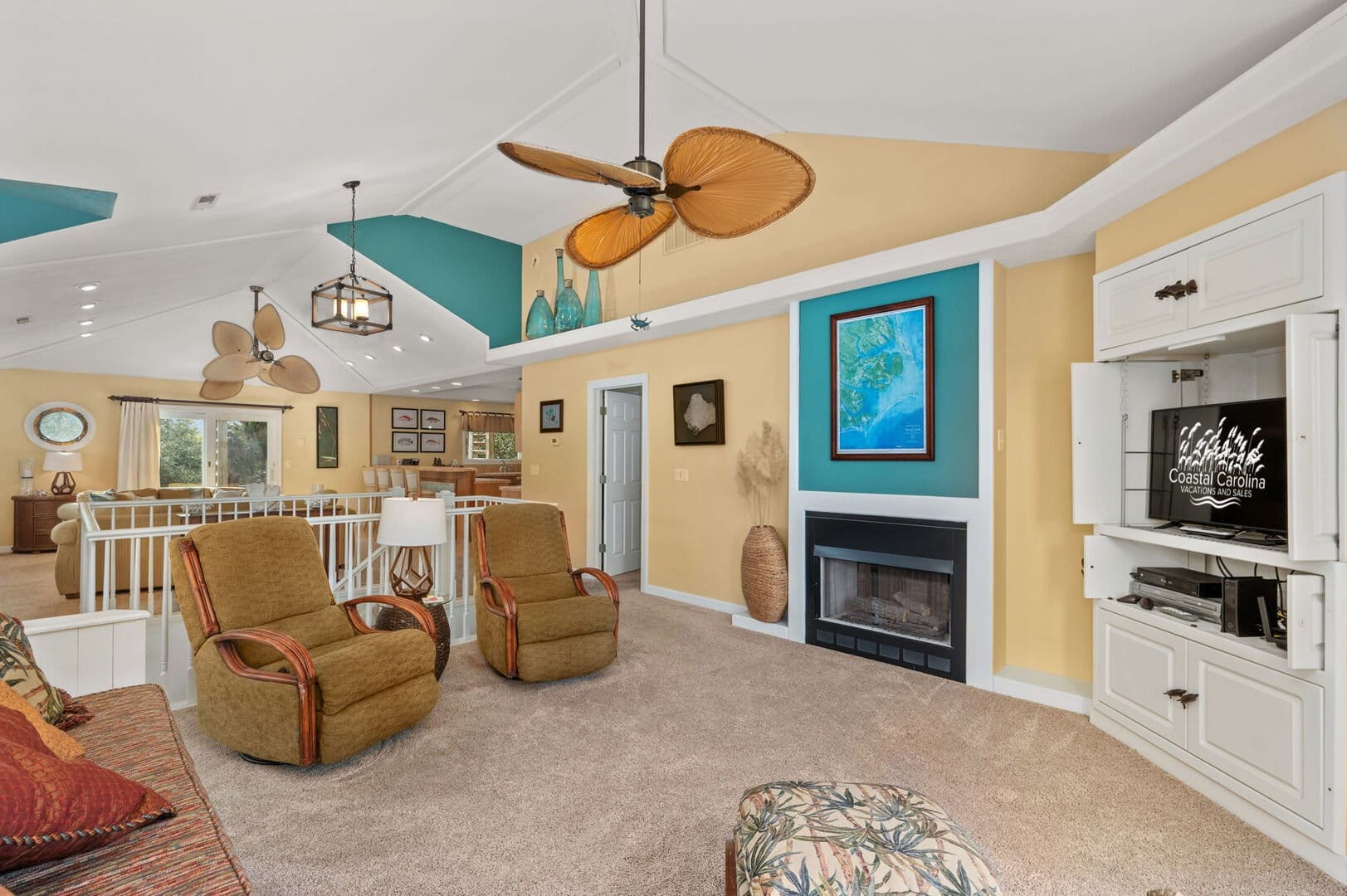 Spacious living room with tropical decor.