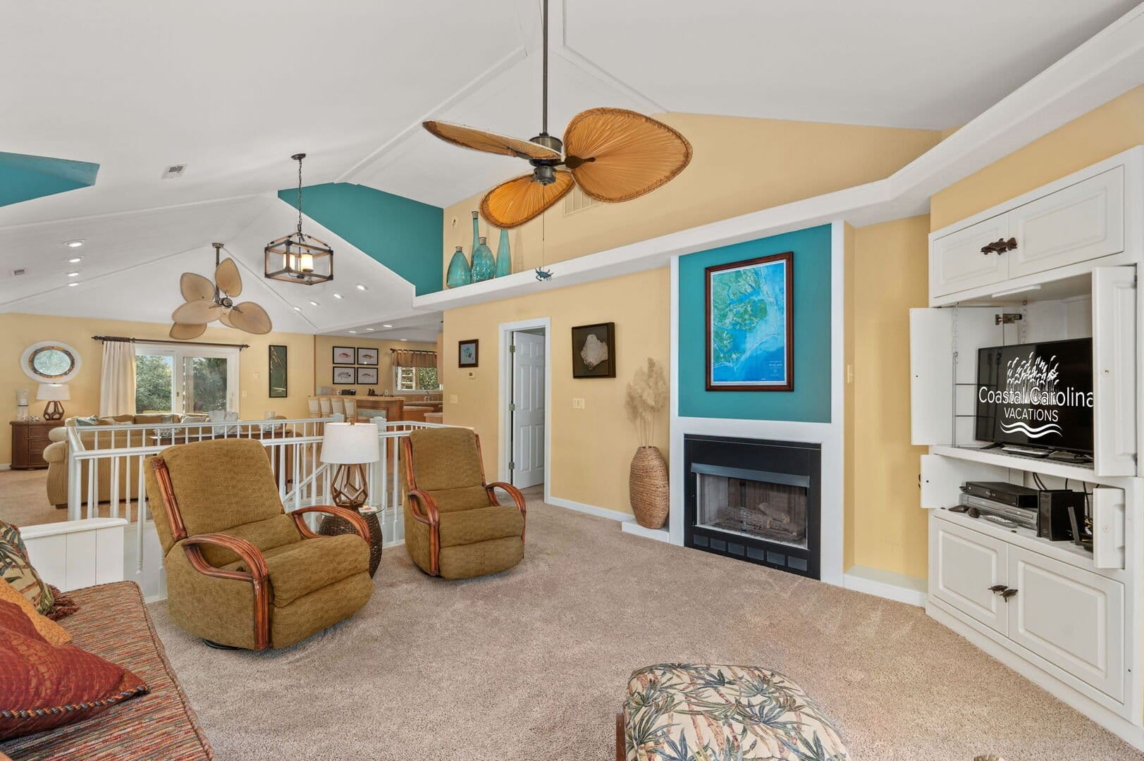 Spacious living room with vaulted ceiling.
