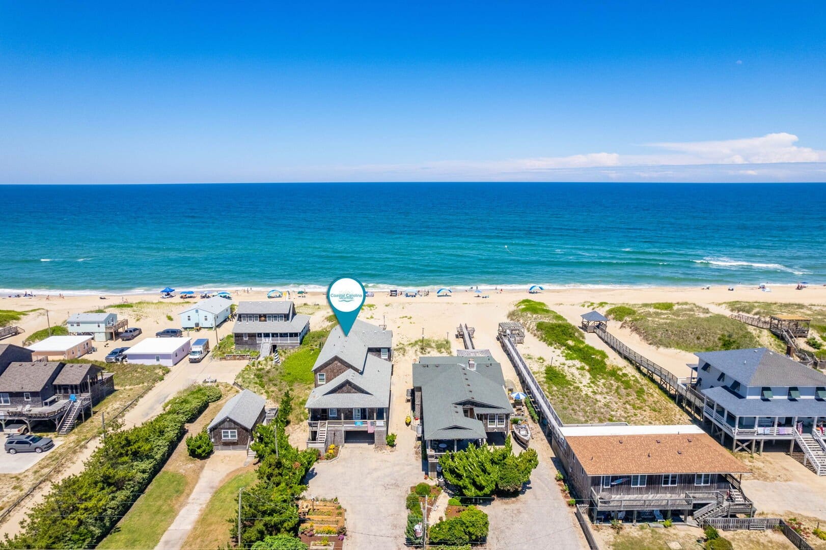 Beachfront houses and ocean view.