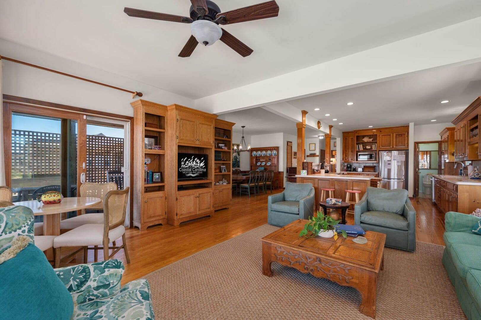 Open-concept living room with kitchen.
