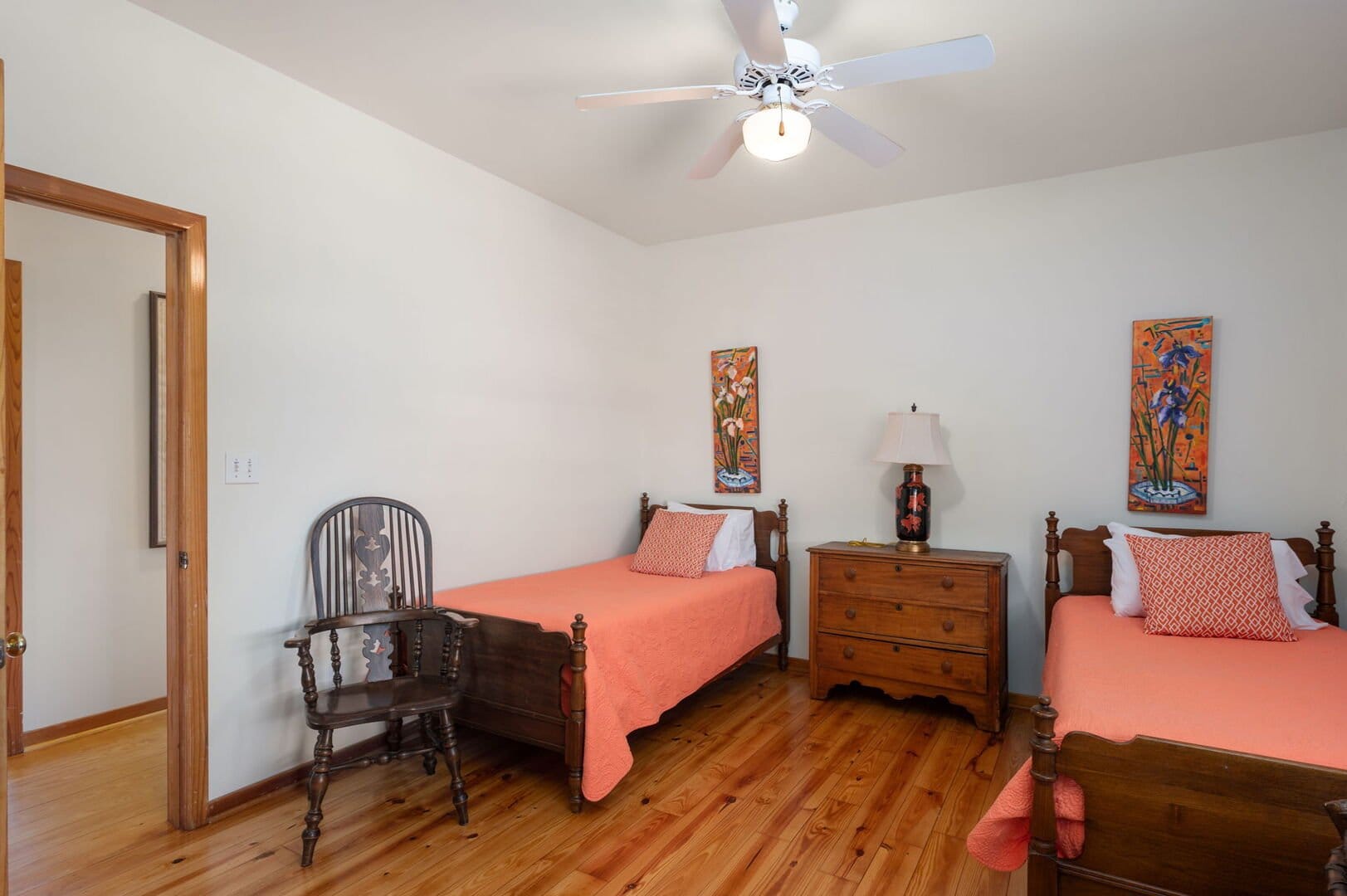 Bedroom with two orange beds.