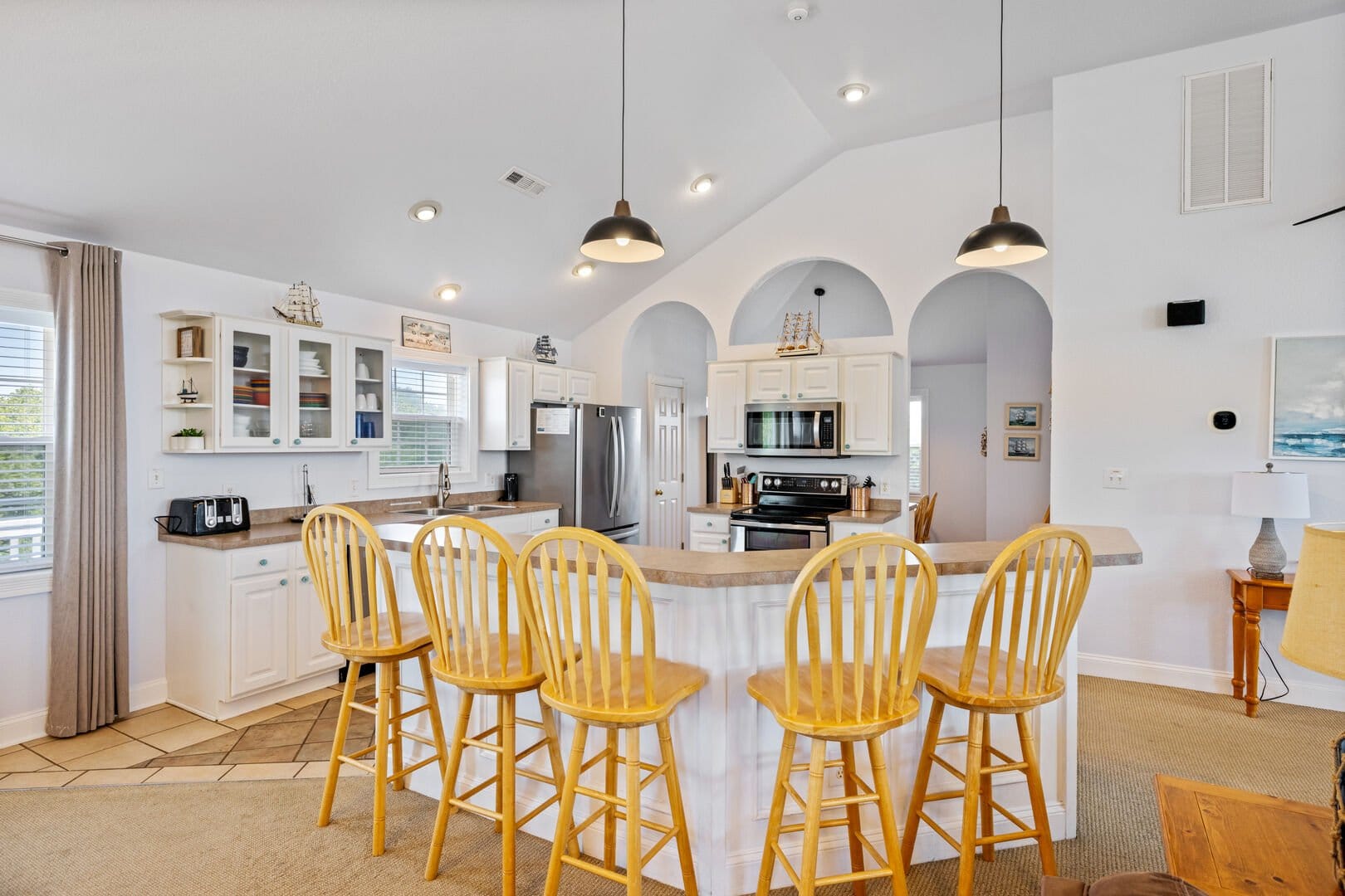 Modern kitchen with barstools.