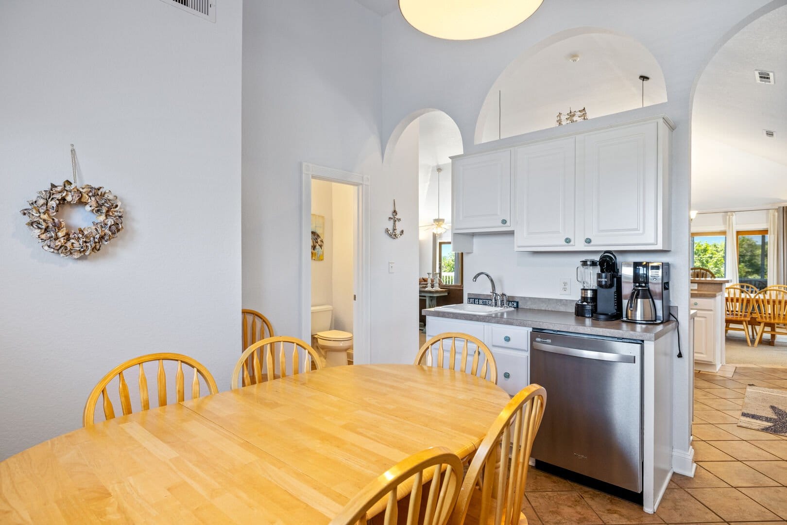 Kitchen and dining area with decor.