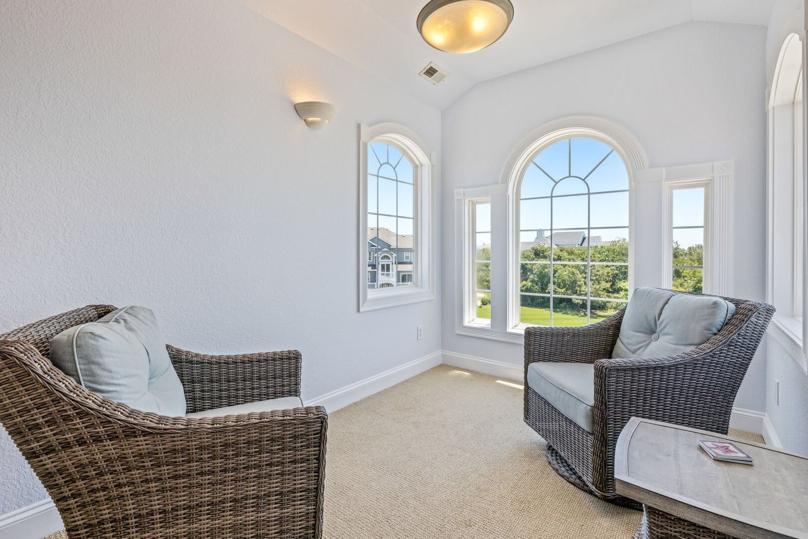 Cozy seating area with windows.