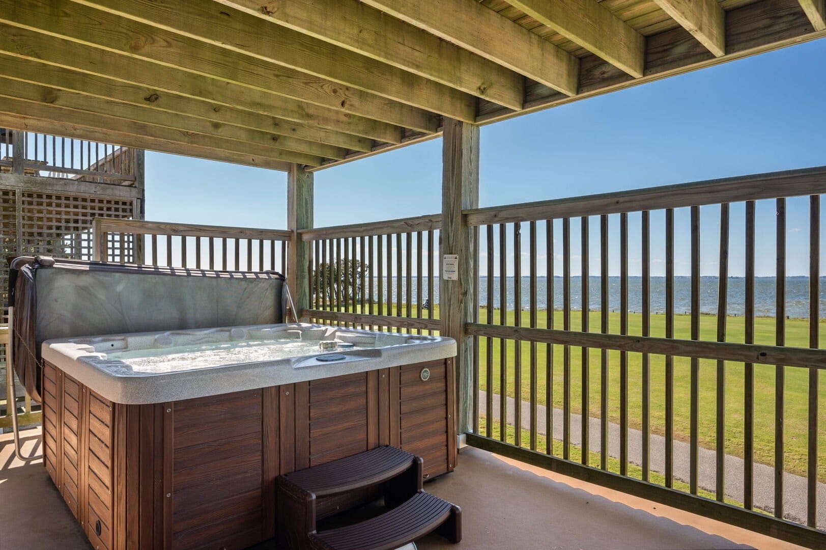 Hot tub overlooking ocean view.