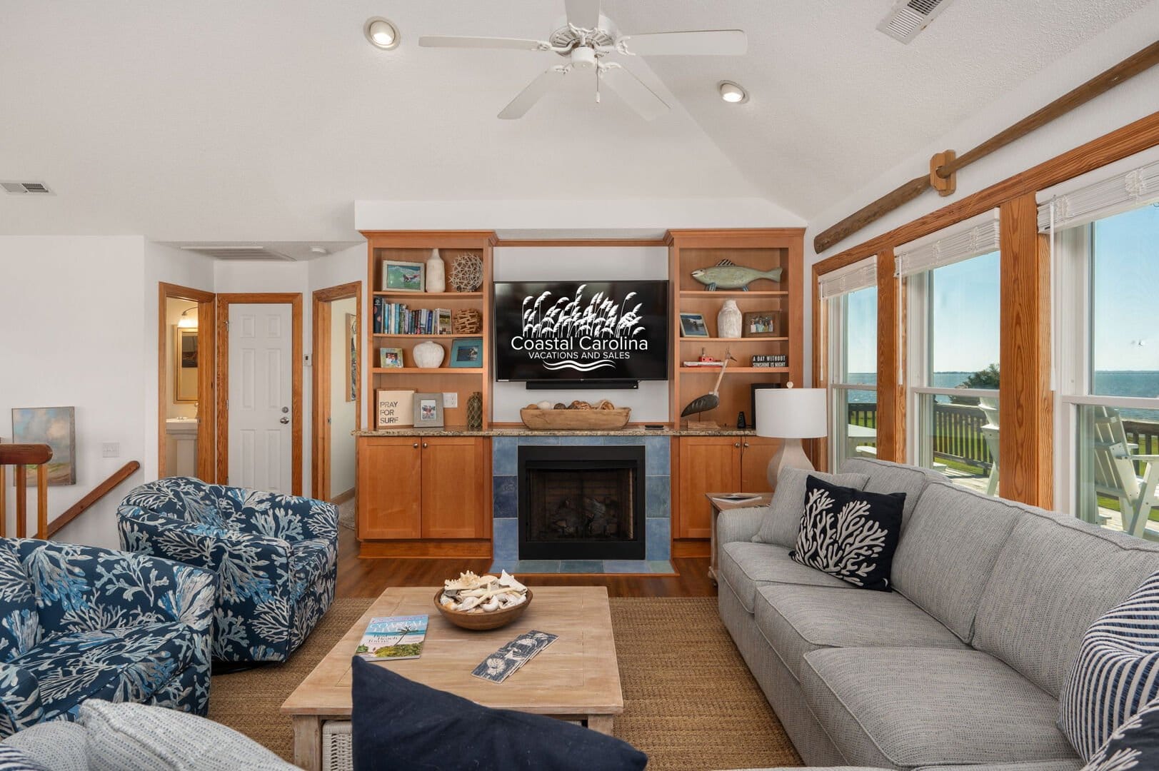 Coastal-themed living room, ocean view.